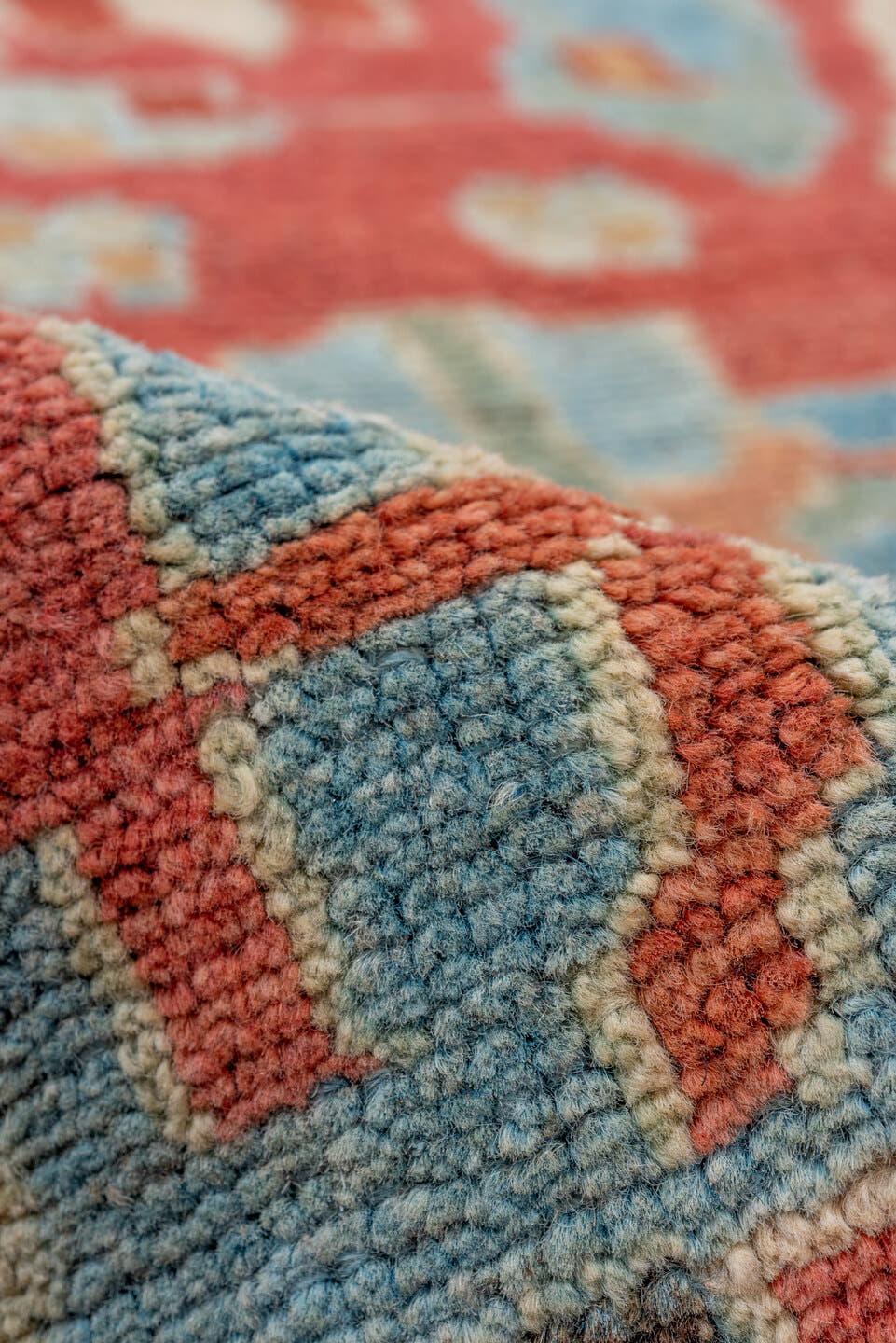5' x 9' one-of-a-kind handmade vintage Lilian medium size rug. Color palette: coral, sky blue, ivory, taupe, rust, brown