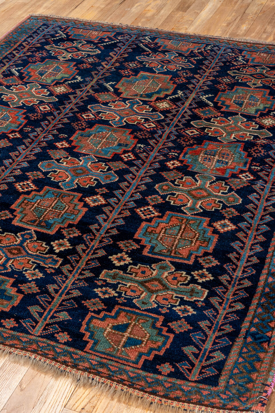 4' x 5' one-of-a-kind handmade vintage Kurd small size rug. Color palette: navy, turquoise, rust, ivory, coral, camel, blue