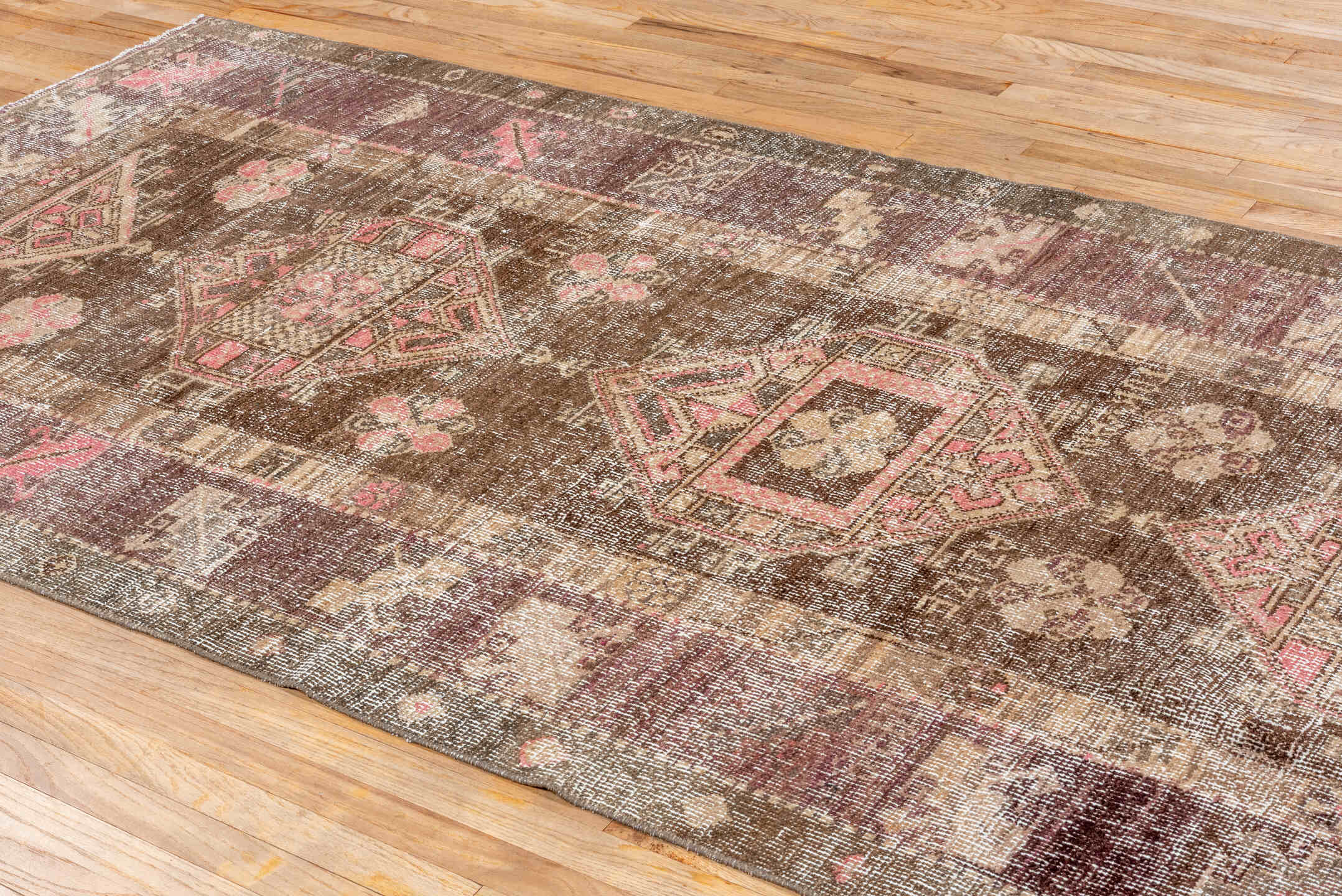 4' x 9' one-of-a-kind handmade vintage Oushak runner rug. Color palette: brown, gray, light gray, off-white, pink, silver