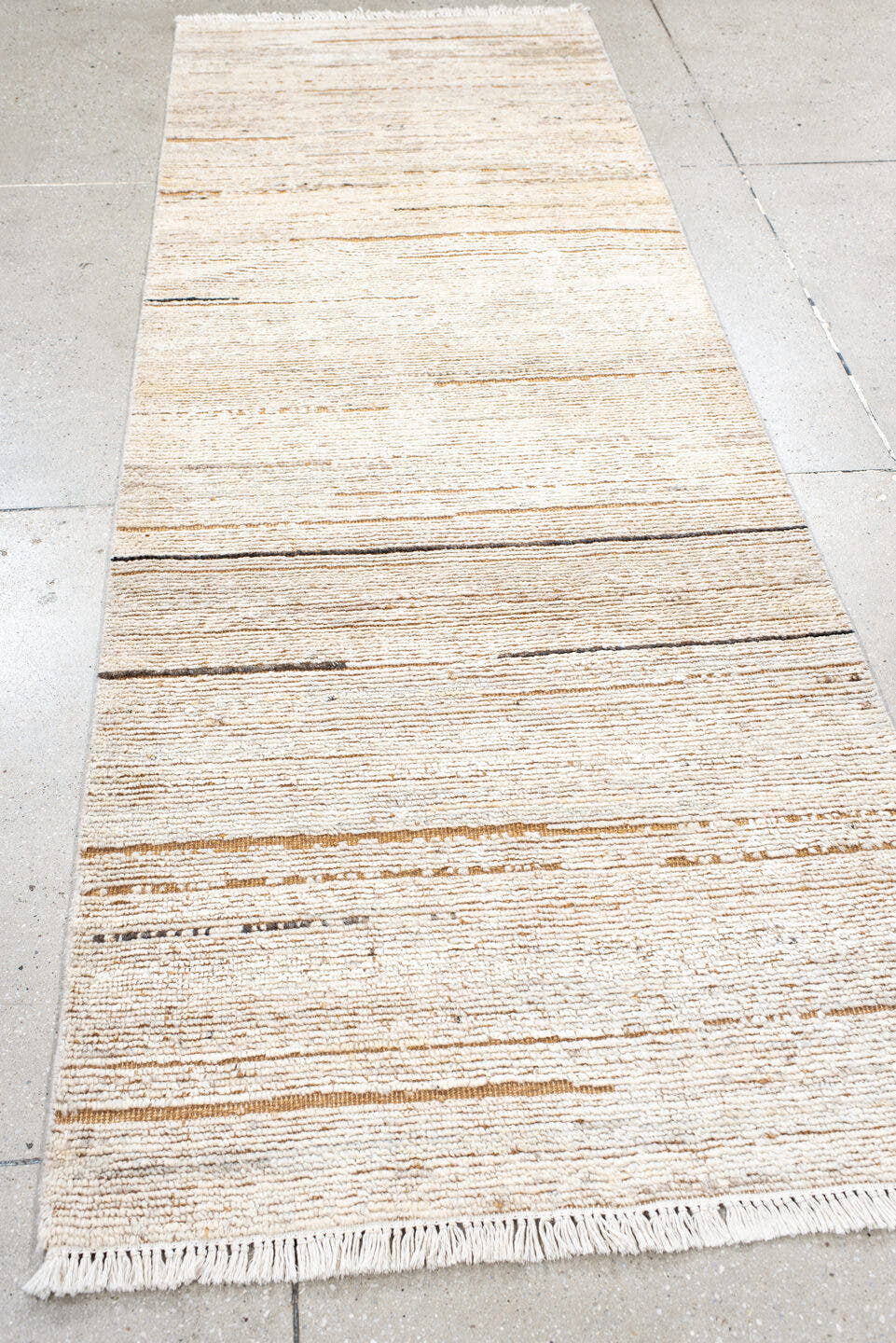 3' x 9' one-of-a-kind handmade vintage Tulu runner rug. Color palette: ivory, cream, camel, taupe, charcoal, beige, gray