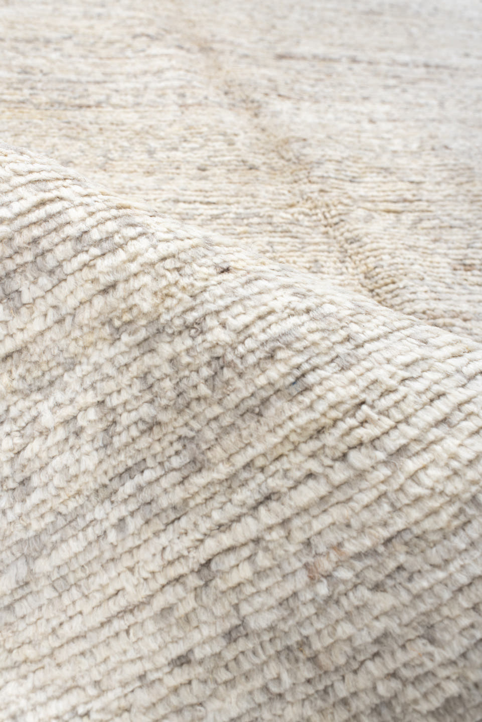5' x 7' one-of-a-kind handmade vintage Tulu rug. Color palette: ivory, cream, taupe, charcoal, beige, gray, black
