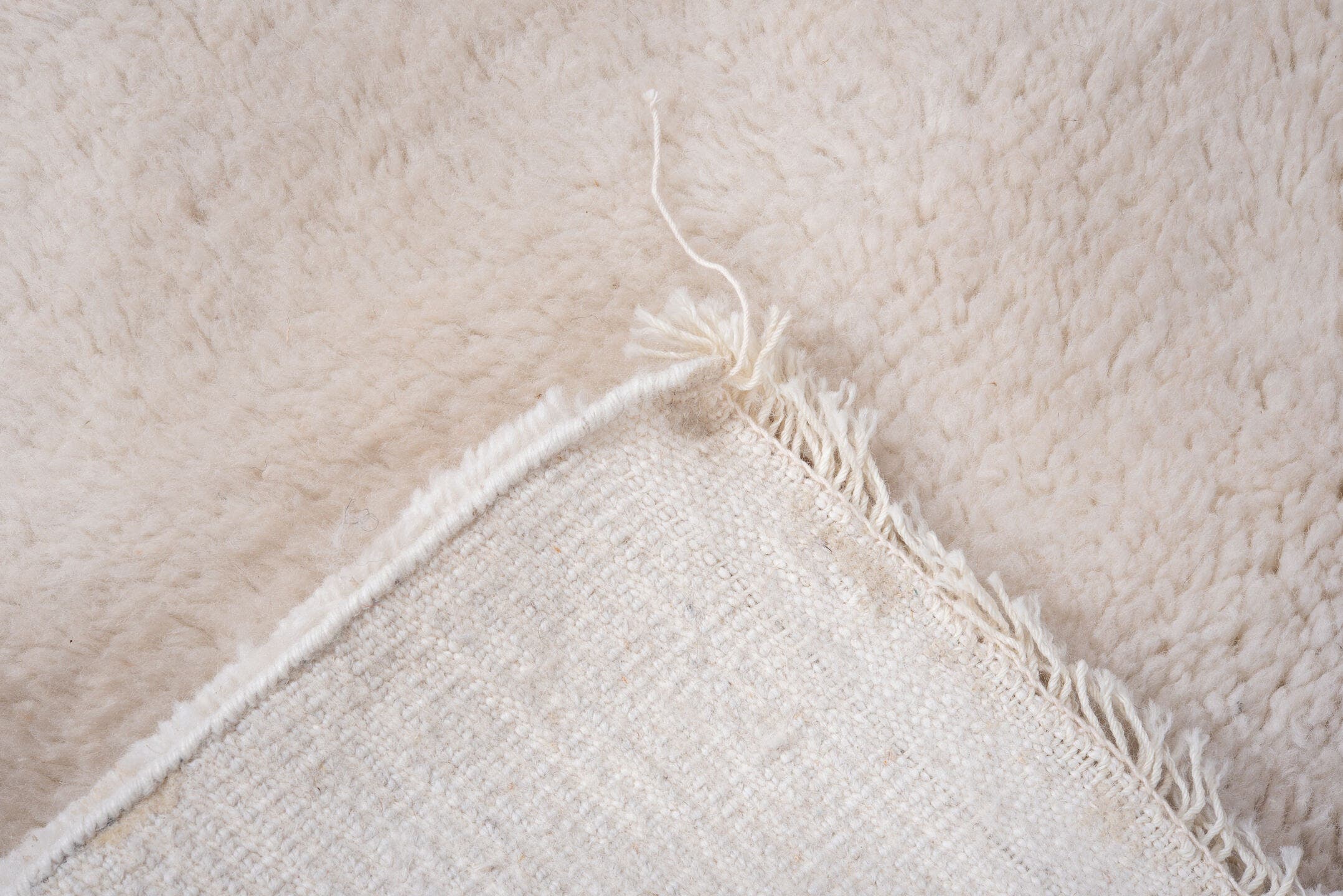 3' x 5' one-of-a-kind handmade vintage Shag small size rug. Color palette: ivory, cream
