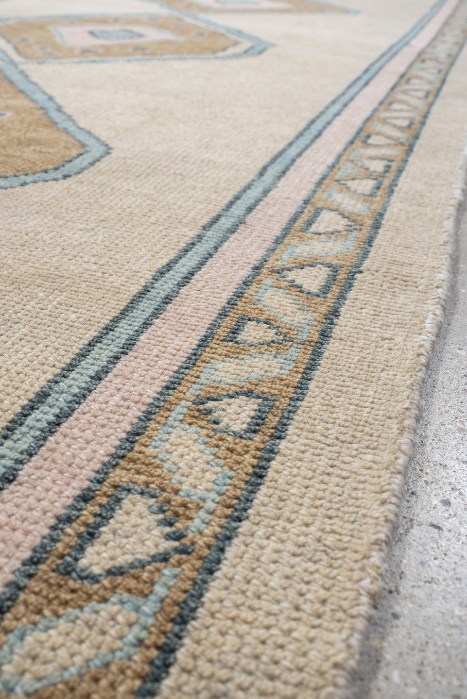 4' x 11' one-of-a-kind handmade vintage Oushak runner rug. Color palette: ivory, sand, pale blue, blush, taupe, beige