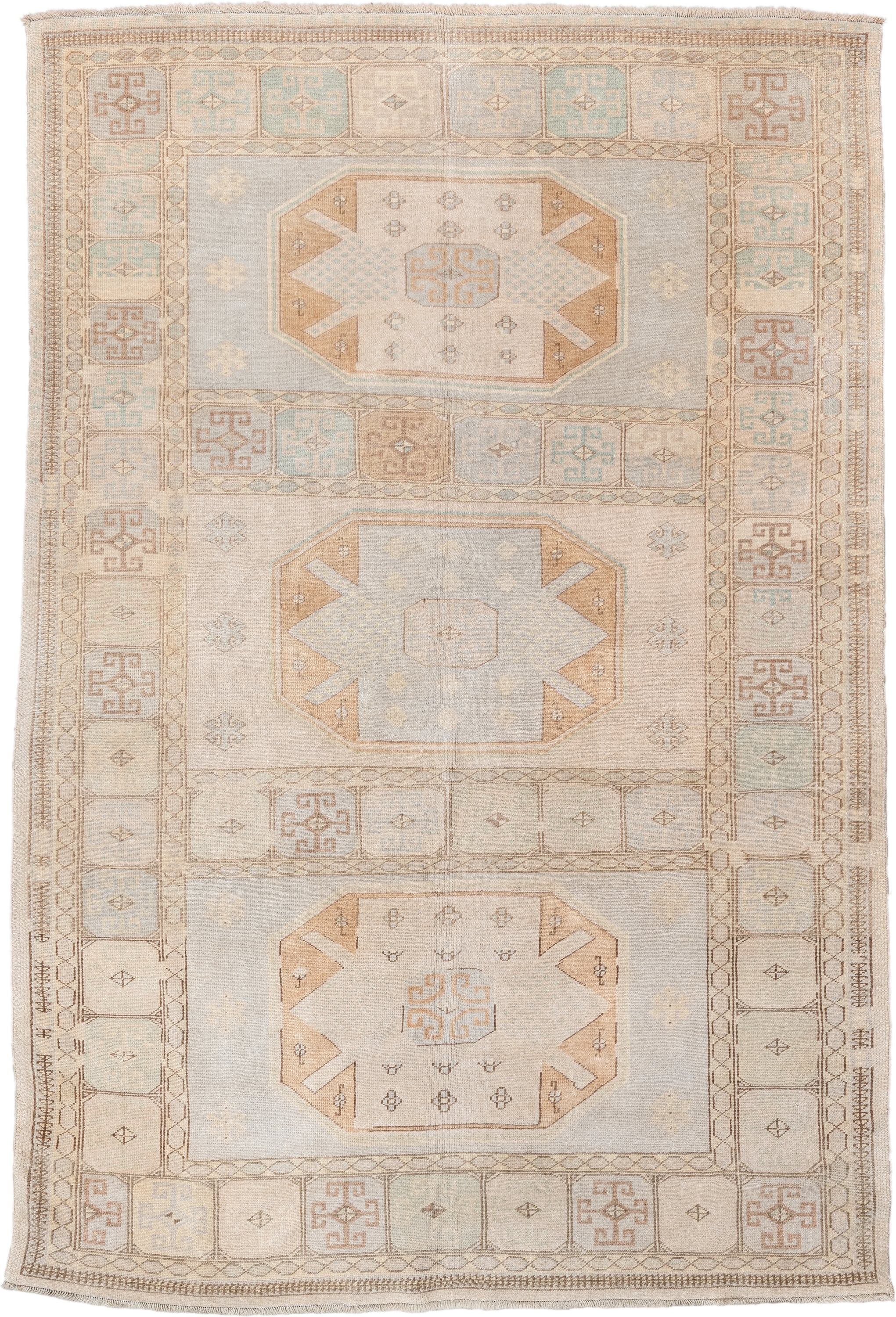 6' x 9' one-of-a-kind handmade vintage  medium size rug. Color palette: ivory, pale blue, beige, camel, taupe, light blue