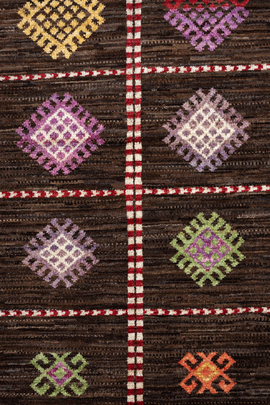 4' x 6' one-of-a-kind handmade vintage Jijim rug. Color palette: dark brown, ivory, coral, lavender, saffron, blue, sage