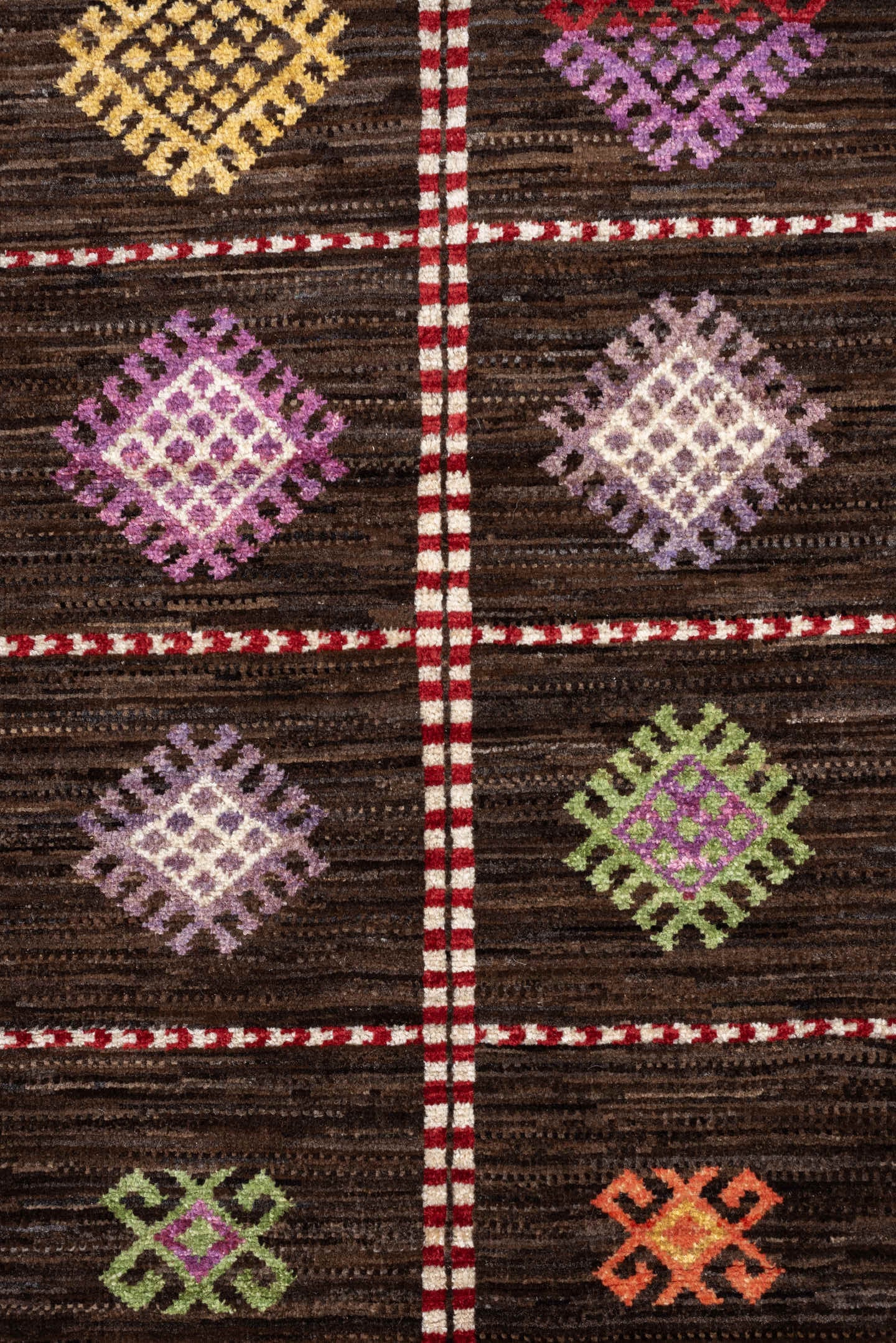 4' x 6' one-of-a-kind handmade vintage Jijim rug. Color palette: dark brown, ivory, coral, lavender, saffron, blue, sage