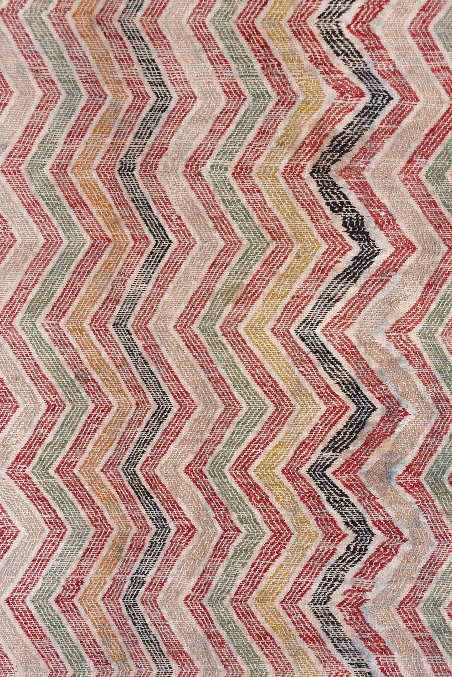 7' x 8' one-of-a-kind handmade vintage Jijim rug. Color palette: ivory, rose, rust, charcoal, sage, gold, pink, red