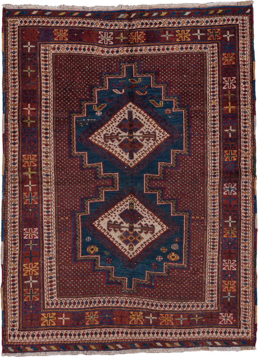 4' x 5' one-of-a-kind handmade antique Afshar small size rug. Color palette: rust, indigo, ivory, burgundy, camel, gold
