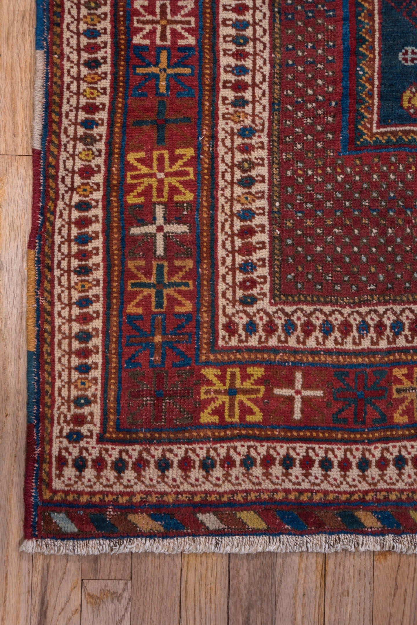 4' x 5' one-of-a-kind handmade antique Afshar small size rug. Color palette: rust, indigo, ivory, burgundy, camel, gold