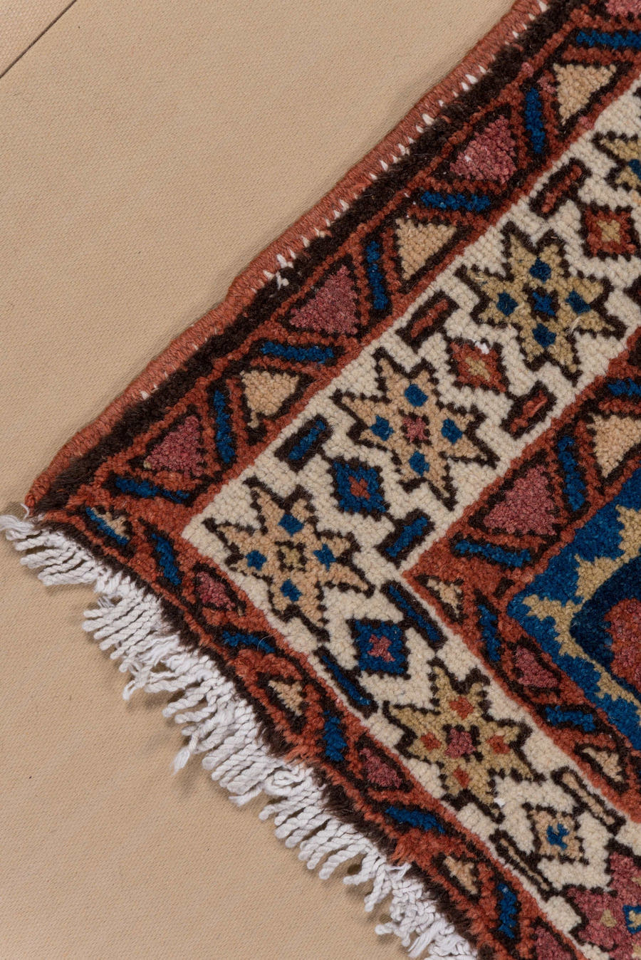 3' x 4' one-of-a-kind handmade antique Karaje small size rug. Color palette: navy, ivory, rust, cobalt, rose, camel, brown