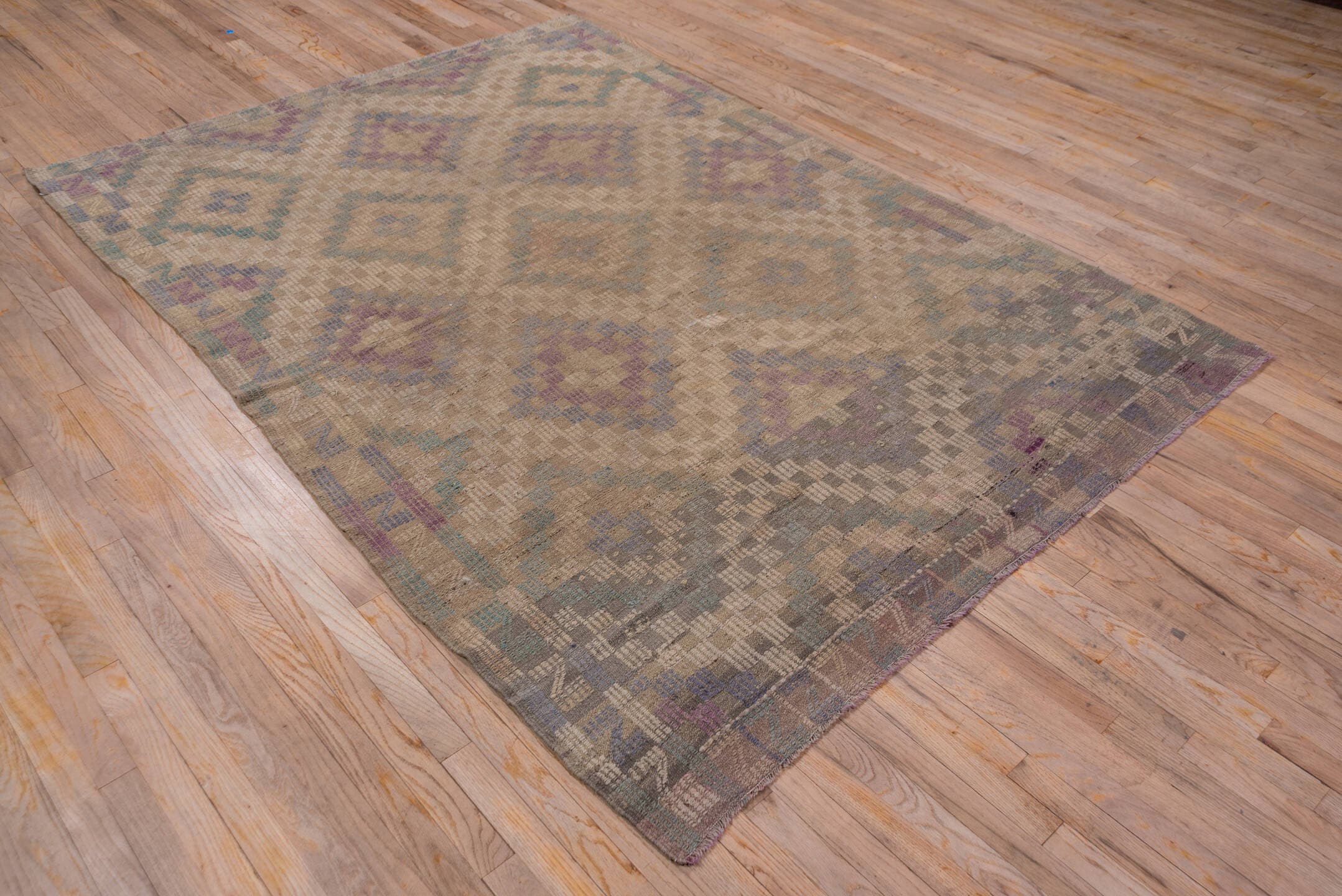 6' x 8' one-of-a-kind handmade vintage Jijim medium size rug. Color palette: taupe, beige, lavender, slate, teal, gray