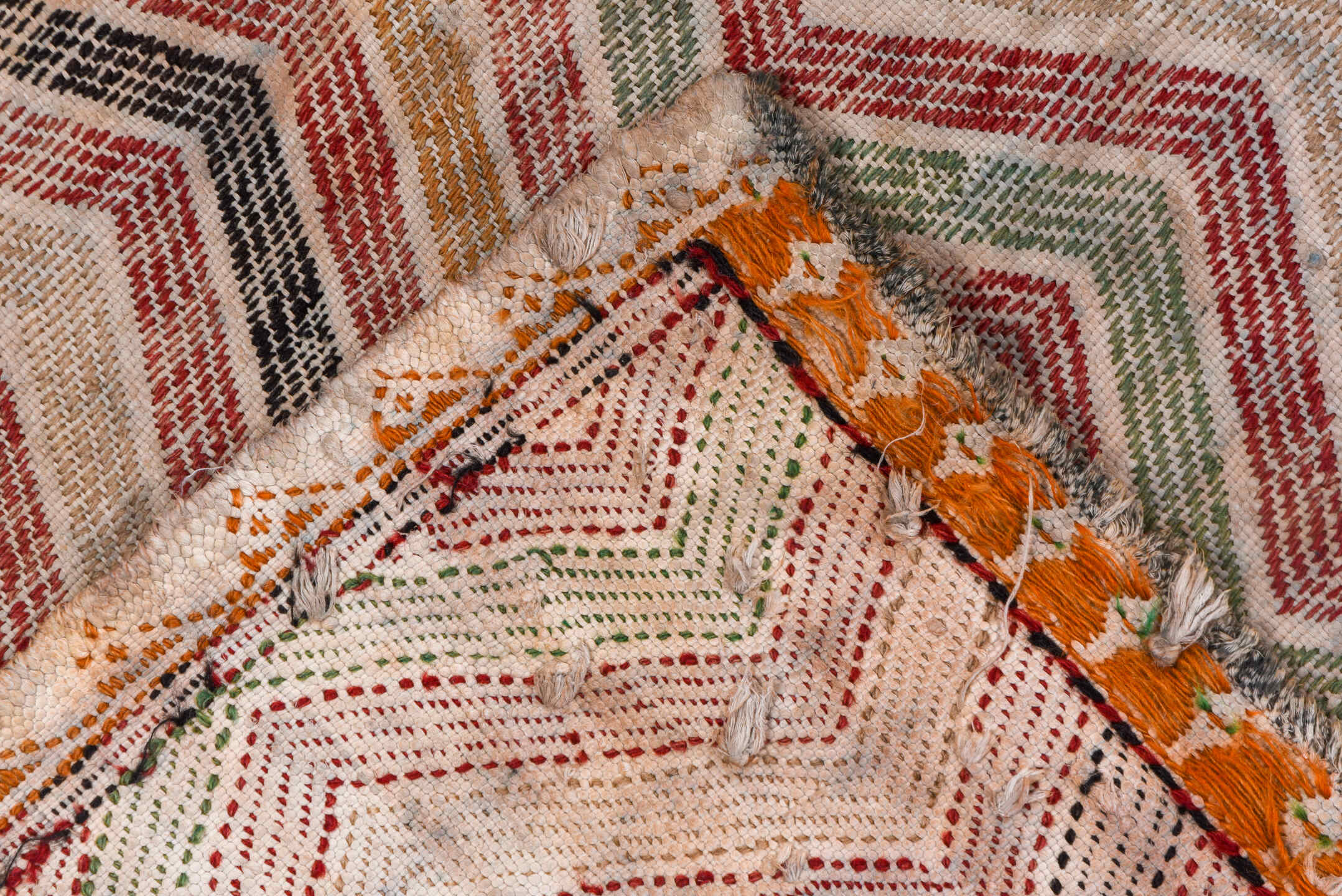 7' x 8' one-of-a-kind handmade vintage Jijim rug. Color palette: brown, ghost white, gray, light gray, off-white, pink, red