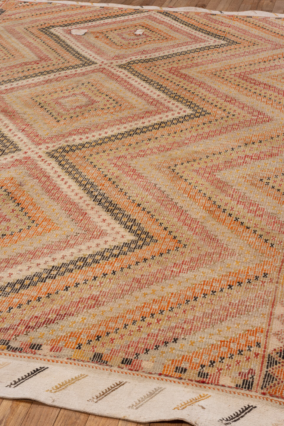 5' x 8' one-of-a-kind handmade vintage Jijim medium size rug. Color palette: ivory, blush, peach, apricot, charcoal, sand
