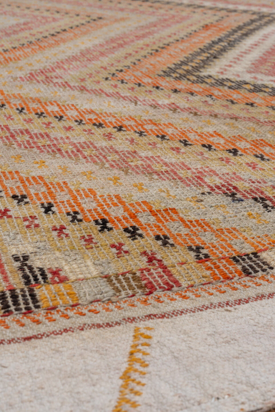 5' x 8' one-of-a-kind handmade vintage Jijim medium size rug. Color palette: ivory, blush, peach, apricot, charcoal, sand