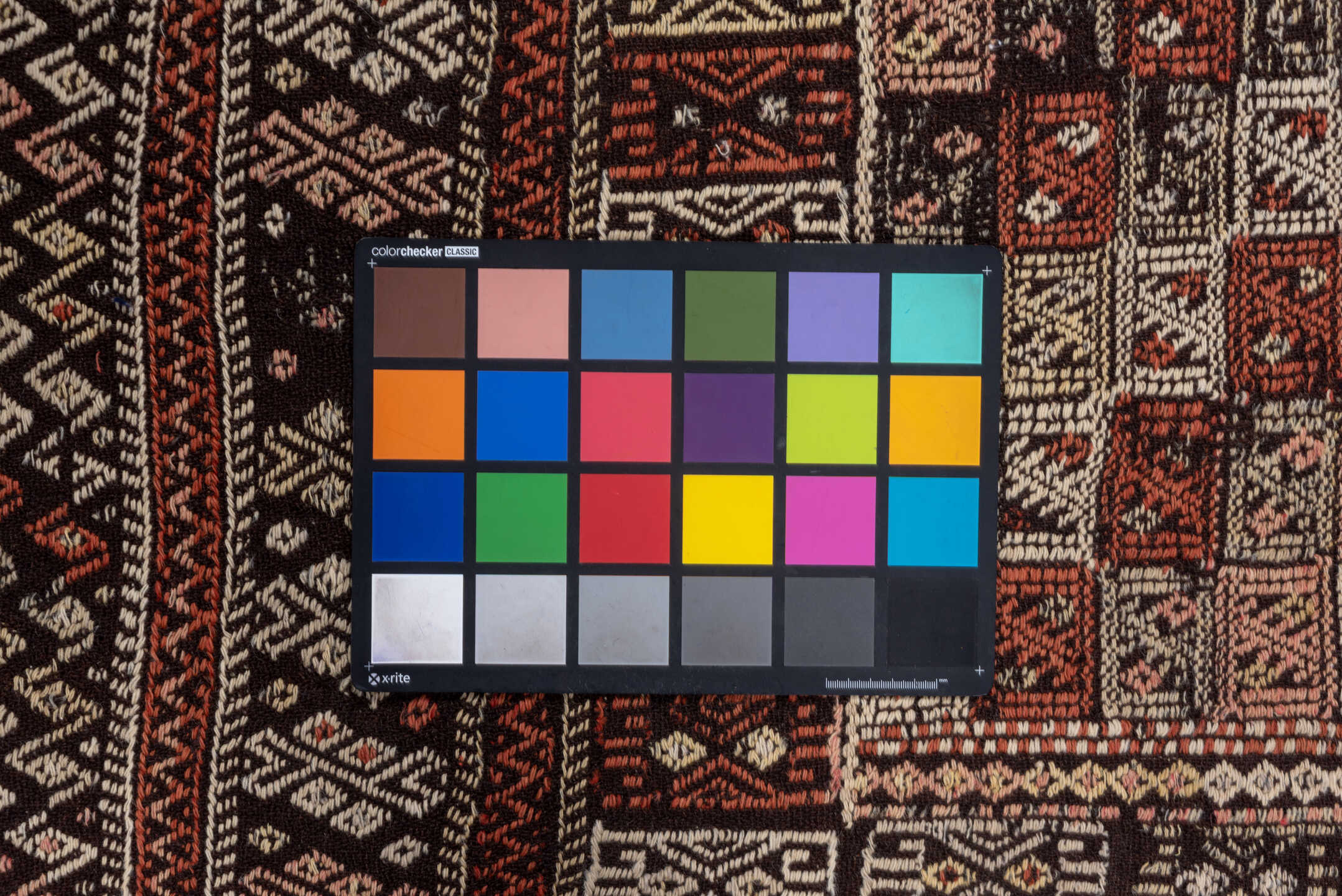 4' x 8' one-of-a-kind handmade vintage Jijim runner rug. Color palette: ivory, rust, charcoal, mahogany, brown, terracotta