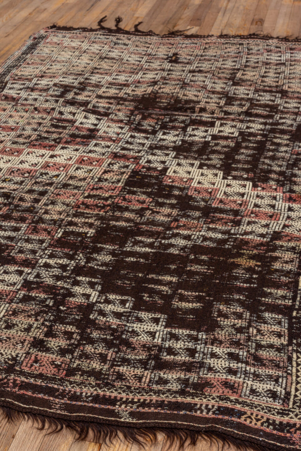 4' x 7' one-of-a-kind handmade vintage Jijim rug. Color palette: dark brown, ivory, rose, taupe, charcoal, brown, pink, red