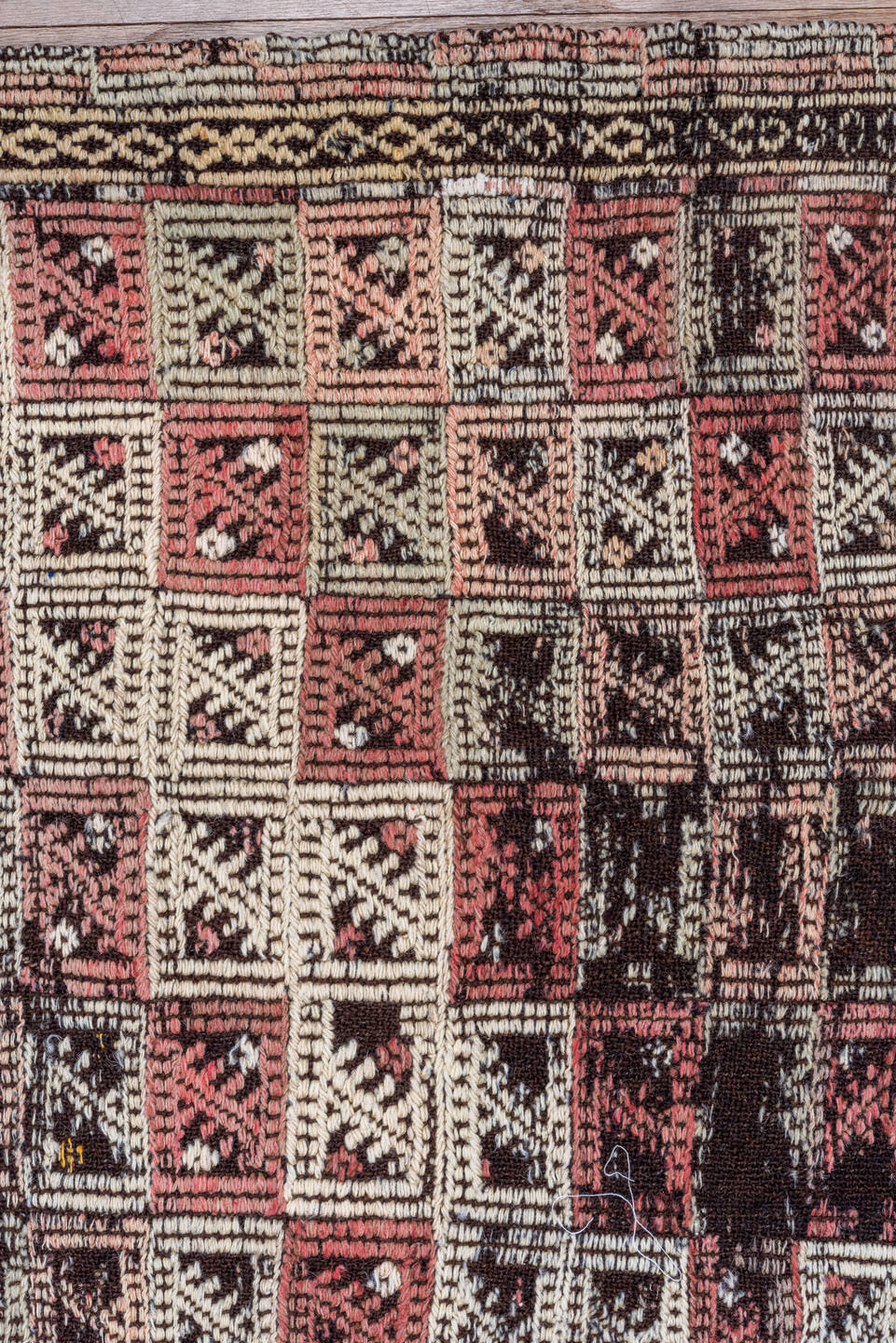 4' x 7' one-of-a-kind handmade vintage Jijim rug. Color palette: dark brown, ivory, rose, taupe, charcoal, brown, pink, red