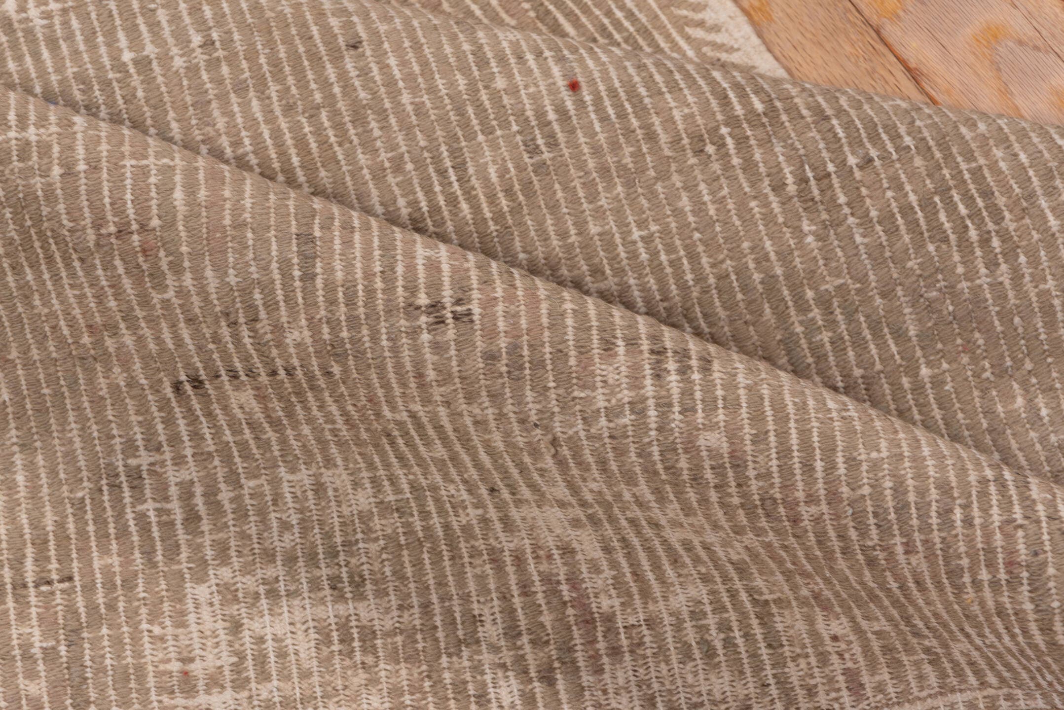 2' x 3' one-of-a-kind handmade vintage Jijim small size rug. Color palette: taupe, blush, beige, ivory, camel, gray, pink