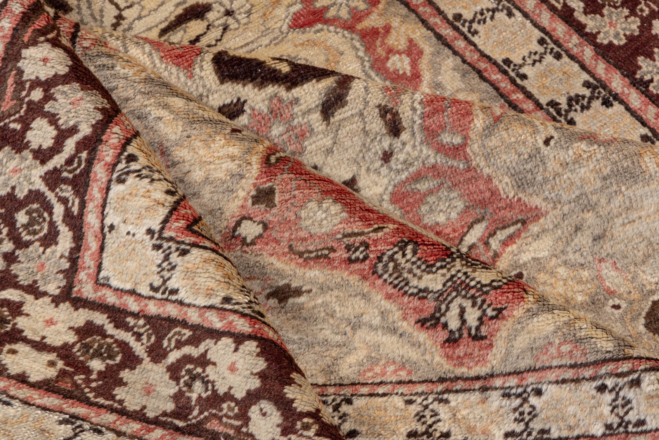 4' x 5' one-of-a-kind handmade vintage Oushak small size rug. Color palette: brown, gray, light gray, pink, red, redwood