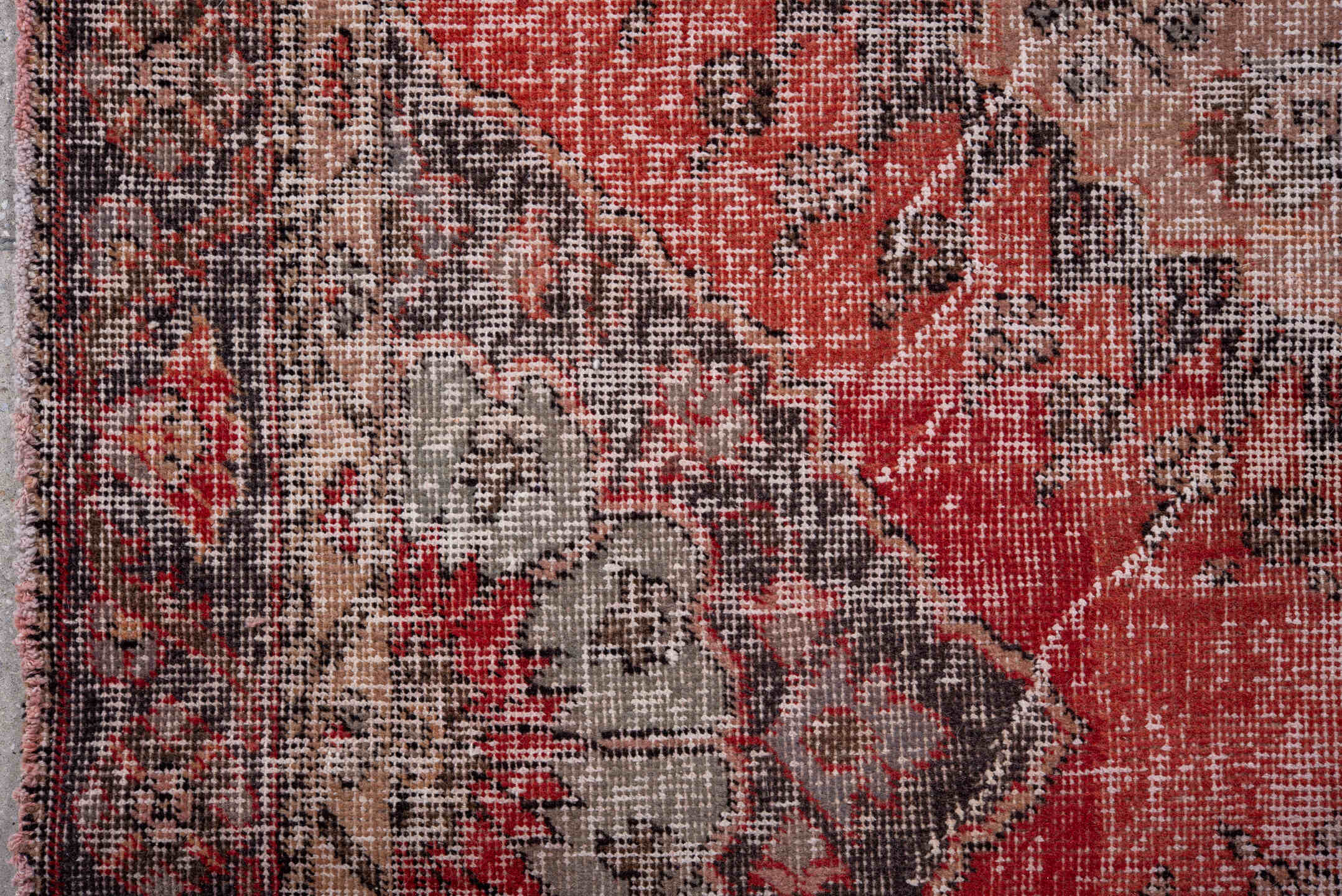 4' x 12' one-of-a-kind handmade vintage Oushak runner rug. Color palette: brown, gray, light gray, off-white, pink, red