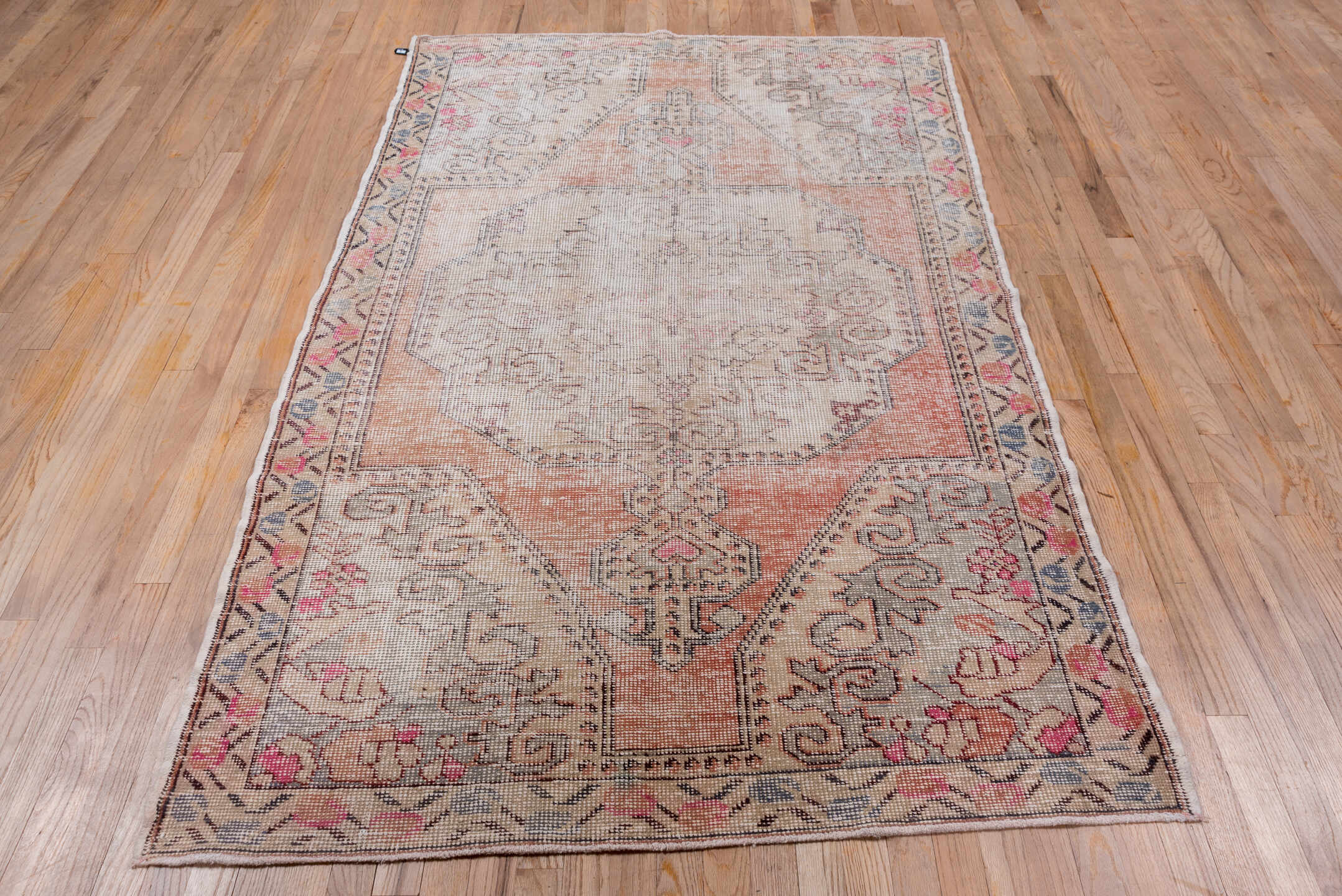 4' x 7' one-of-a-kind handmade vintage Oushak rug. Color palette: ivory, blush, peach, taupe, rose, slate, brown, pink