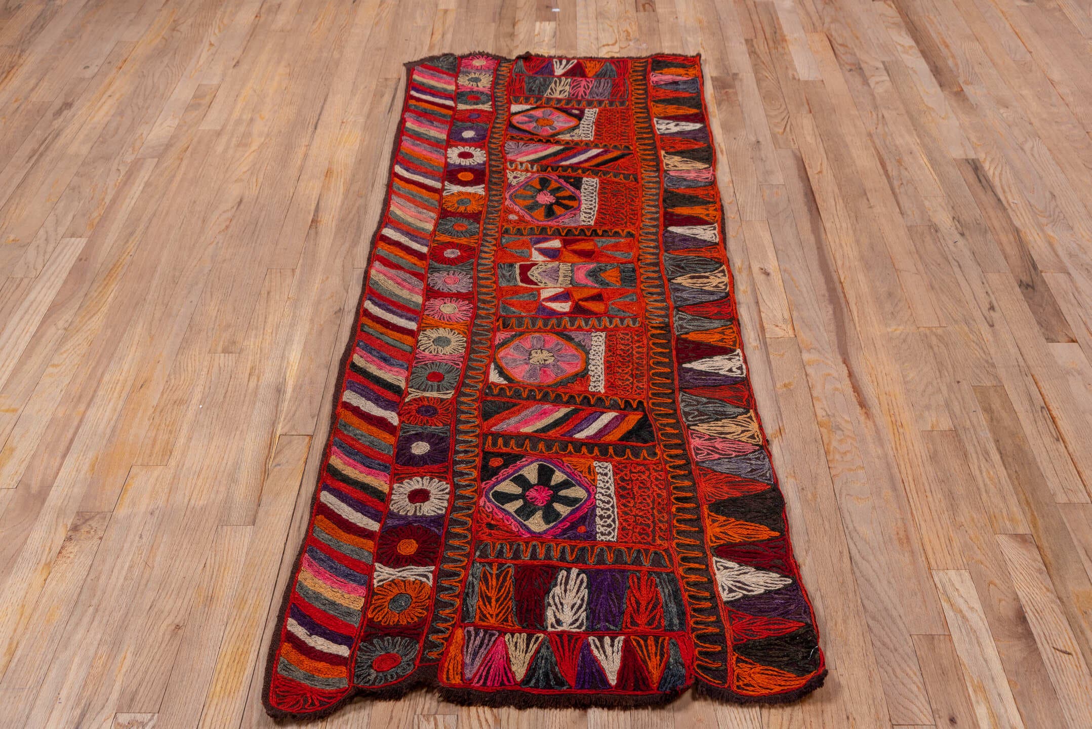 2' x 6' one-of-a-kind handmade vintage Kilim runner rug. Color palette: burgundy, rust, charcoal, violet, ivory, rose