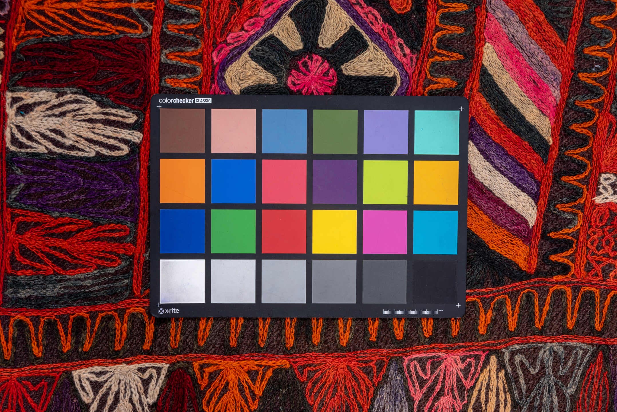 2' x 6' one-of-a-kind handmade vintage Kilim runner rug. Color palette: burgundy, rust, charcoal, violet, ivory, rose