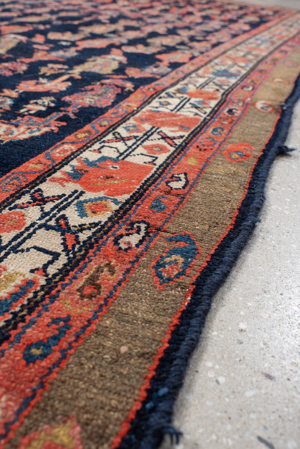 4' x 11' one-of-a-kind handmade vintage Malayer runner rug. Color palette: brown, rust, ivory, navy, coral, gold, camel