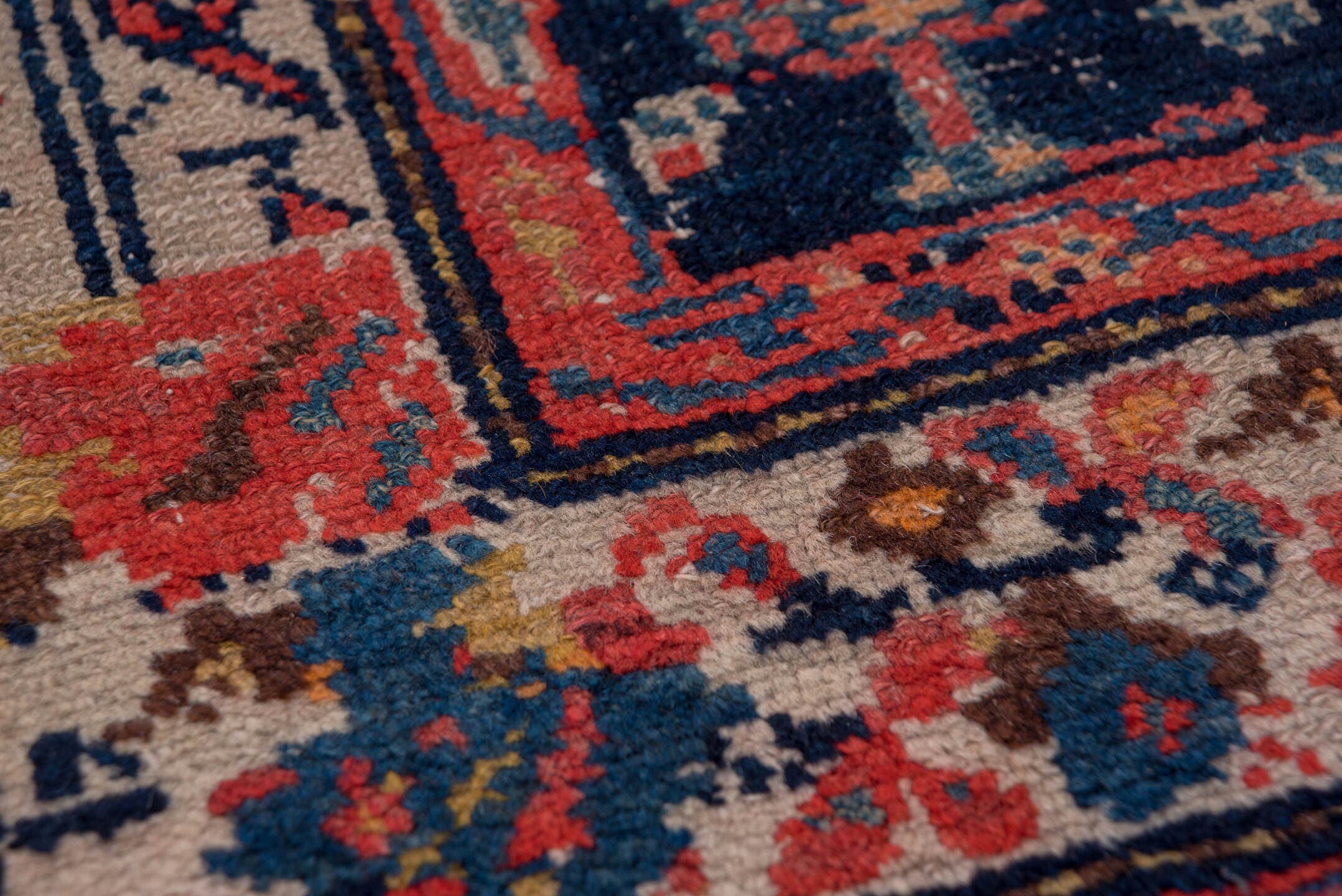 4' x 11' one-of-a-kind handmade vintage Malayer runner rug. Color palette: brown, rust, ivory, navy, coral, gold, camel