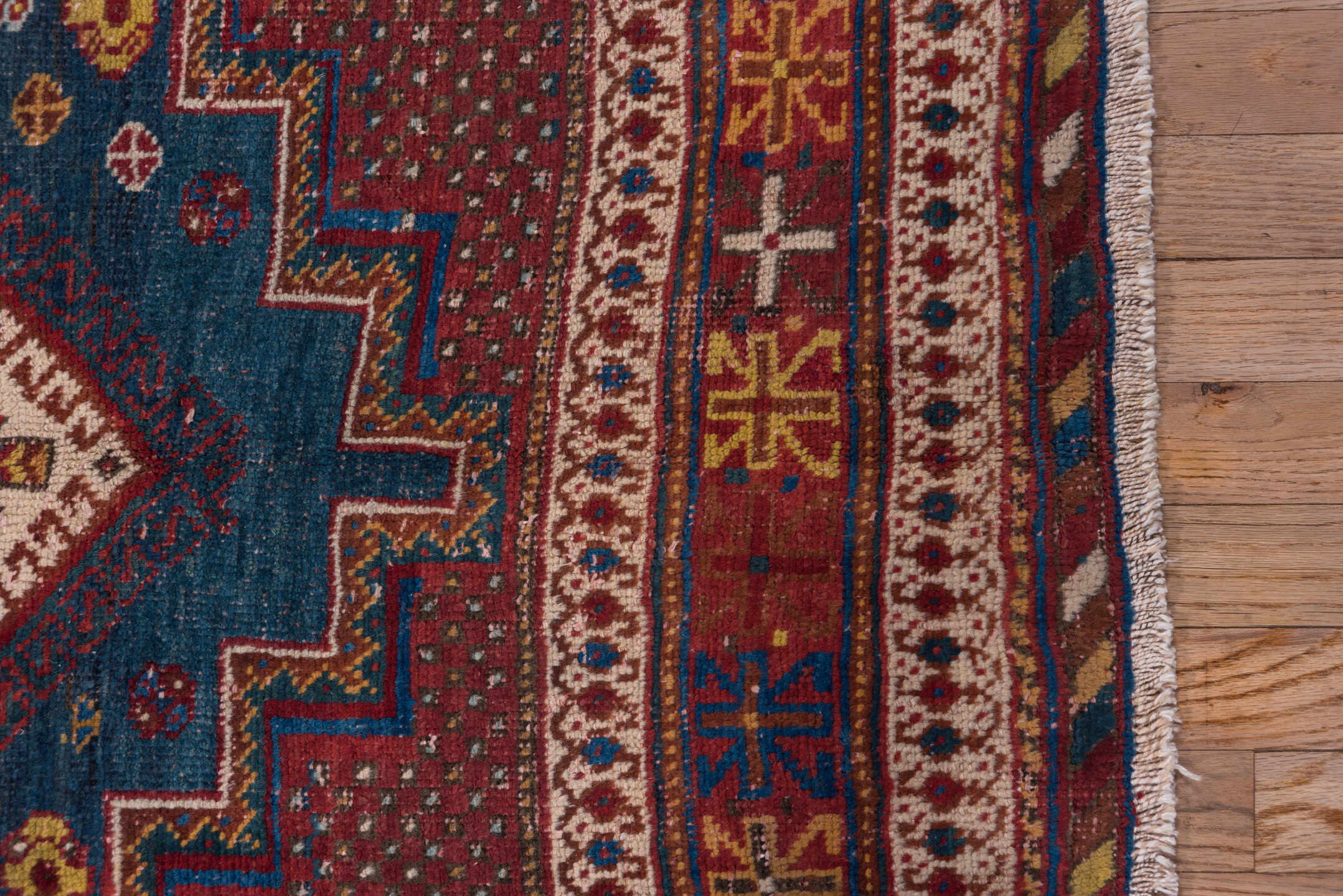 4' x 5' one-of-a-kind handmade antique Afshar small size rug. Color palette: rust, indigo, ivory, burgundy, camel, gold
