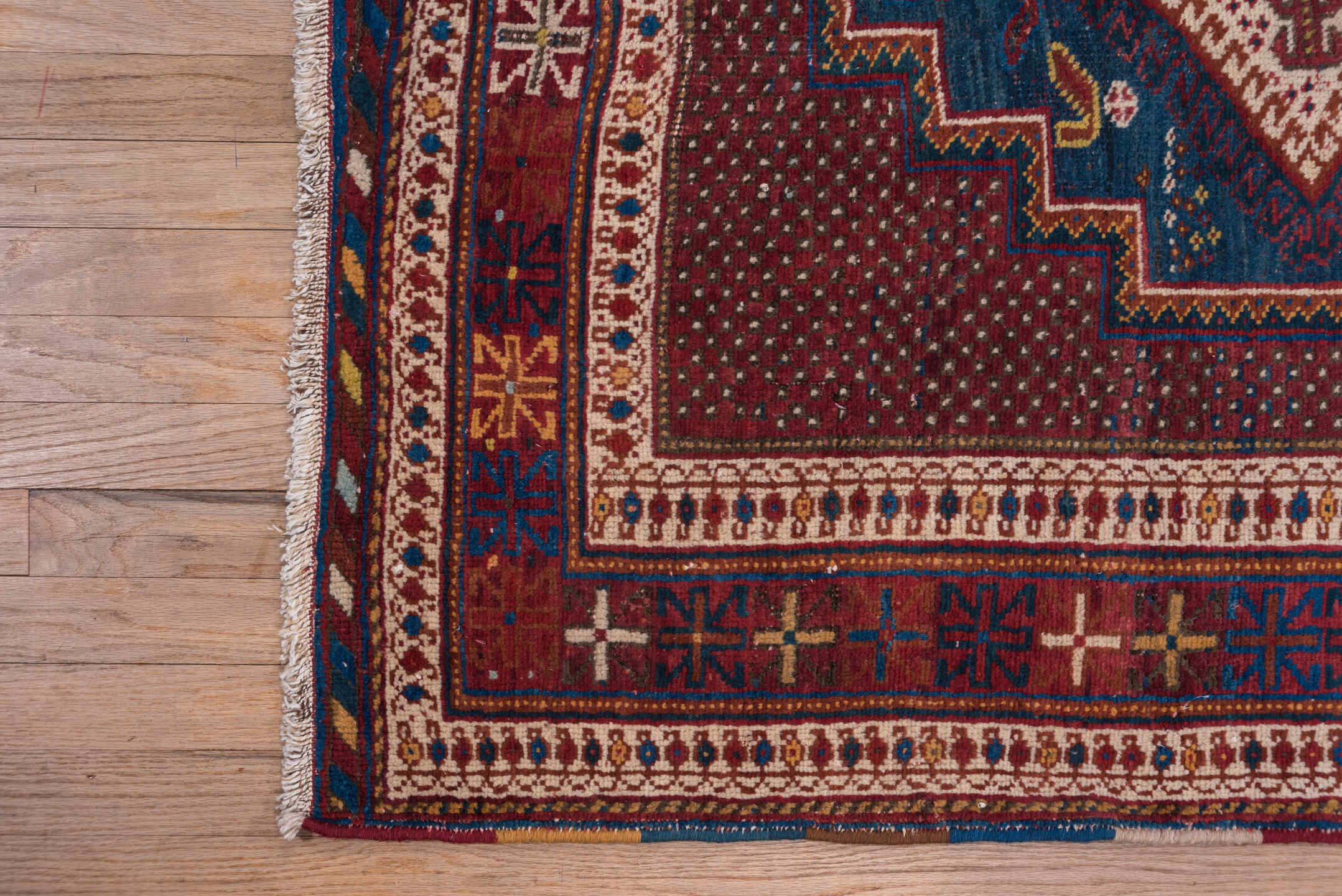 4' x 5' one-of-a-kind handmade antique Afshar small size rug. Color palette: rust, indigo, ivory, burgundy, camel, gold