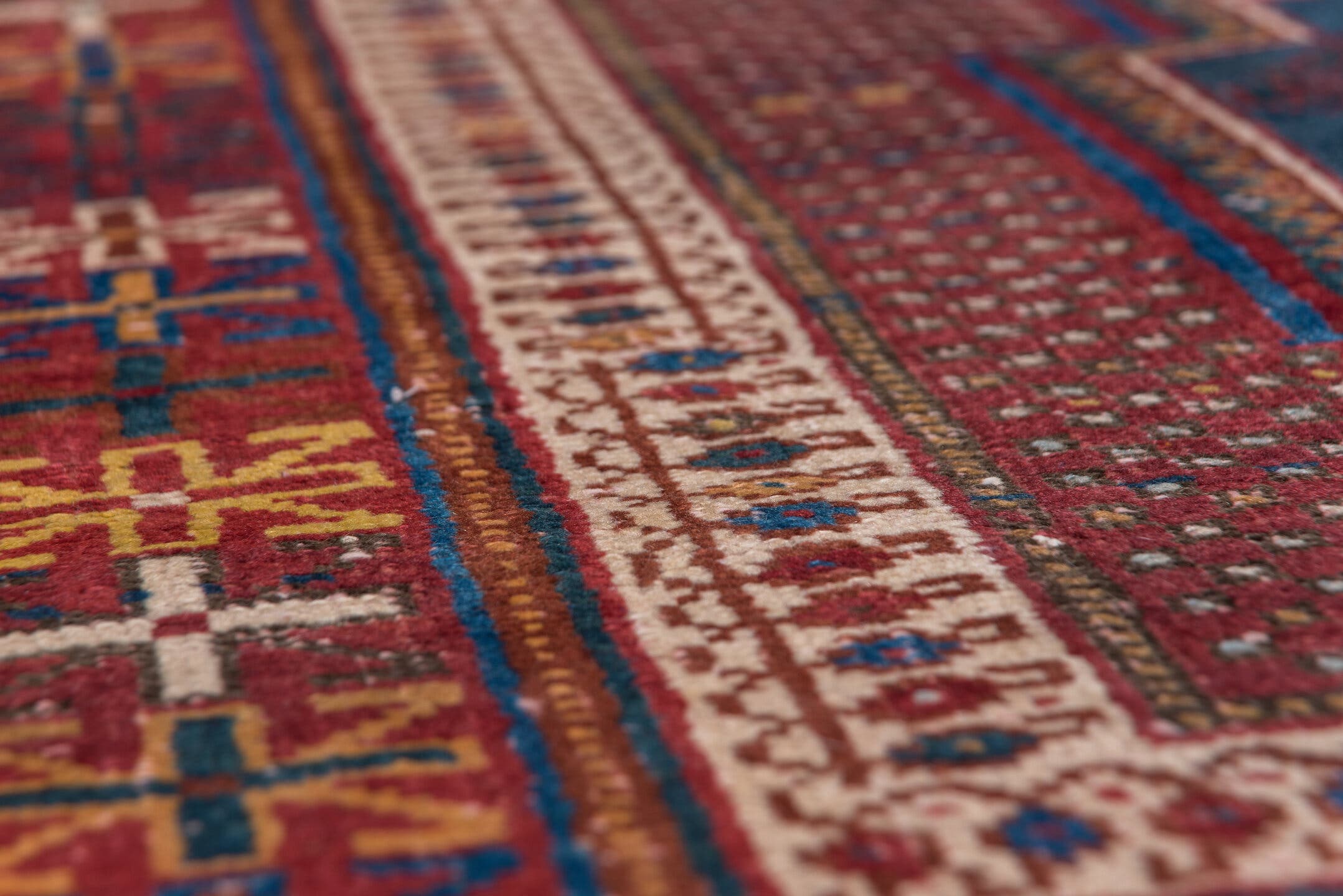 4' x 5' one-of-a-kind handmade antique Afshar small size rug. Color palette: rust, indigo, ivory, burgundy, camel, gold