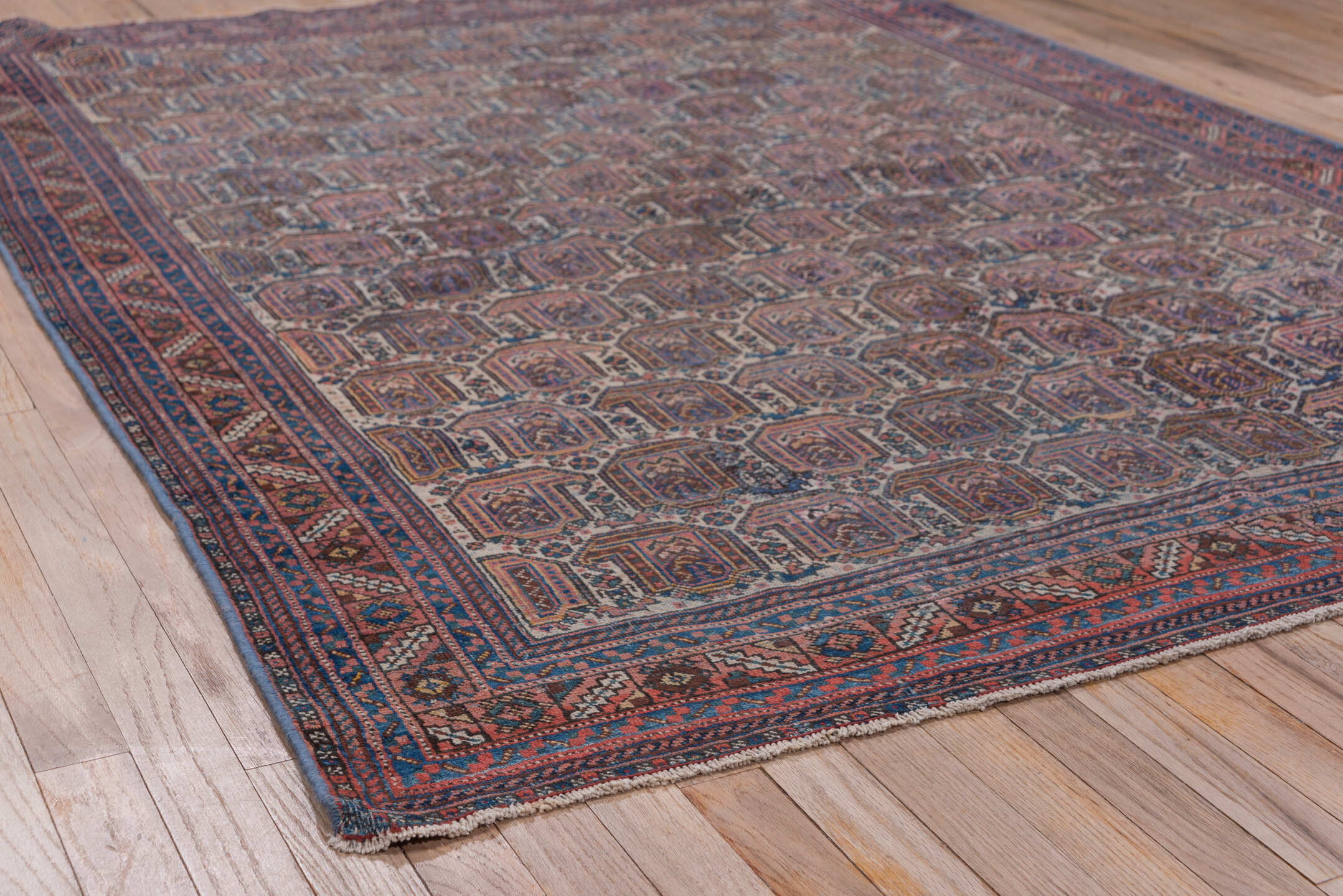 5' x 6' one-of-a-kind handmade vintage Afshar rug. Color palette: blue, brown, dark gray, gray, light gray, off-white, pink