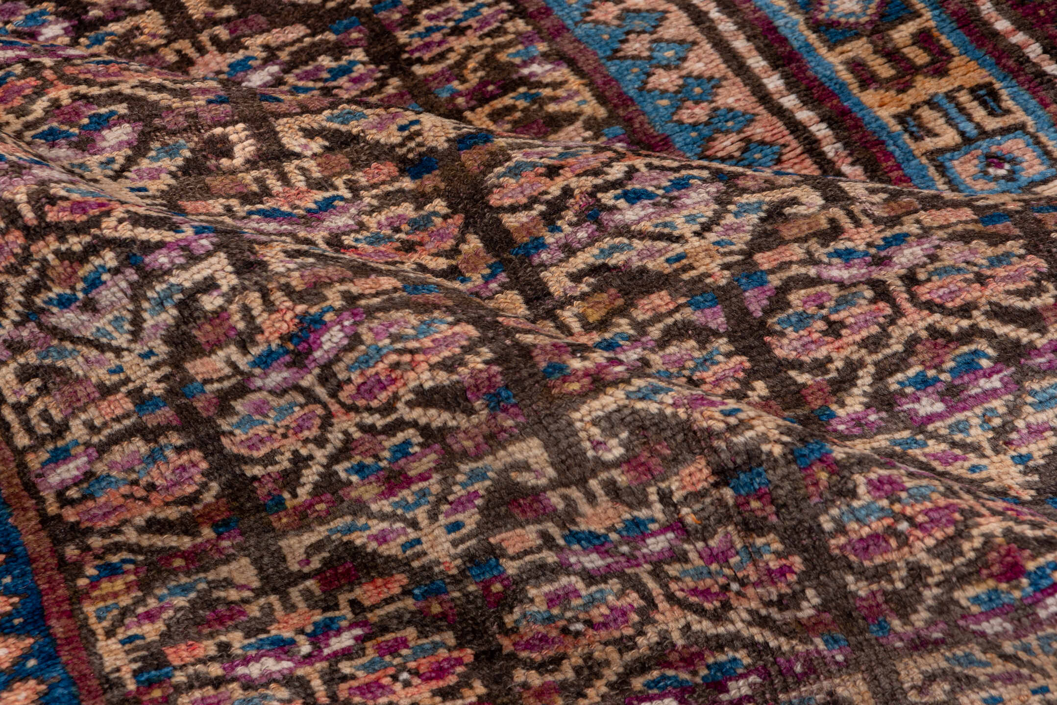 3' x 6' one-of-a-kind handmade antique Kurd small size rug. Color palette: brown, ivory, indigo, sky blue, rose, burgundy