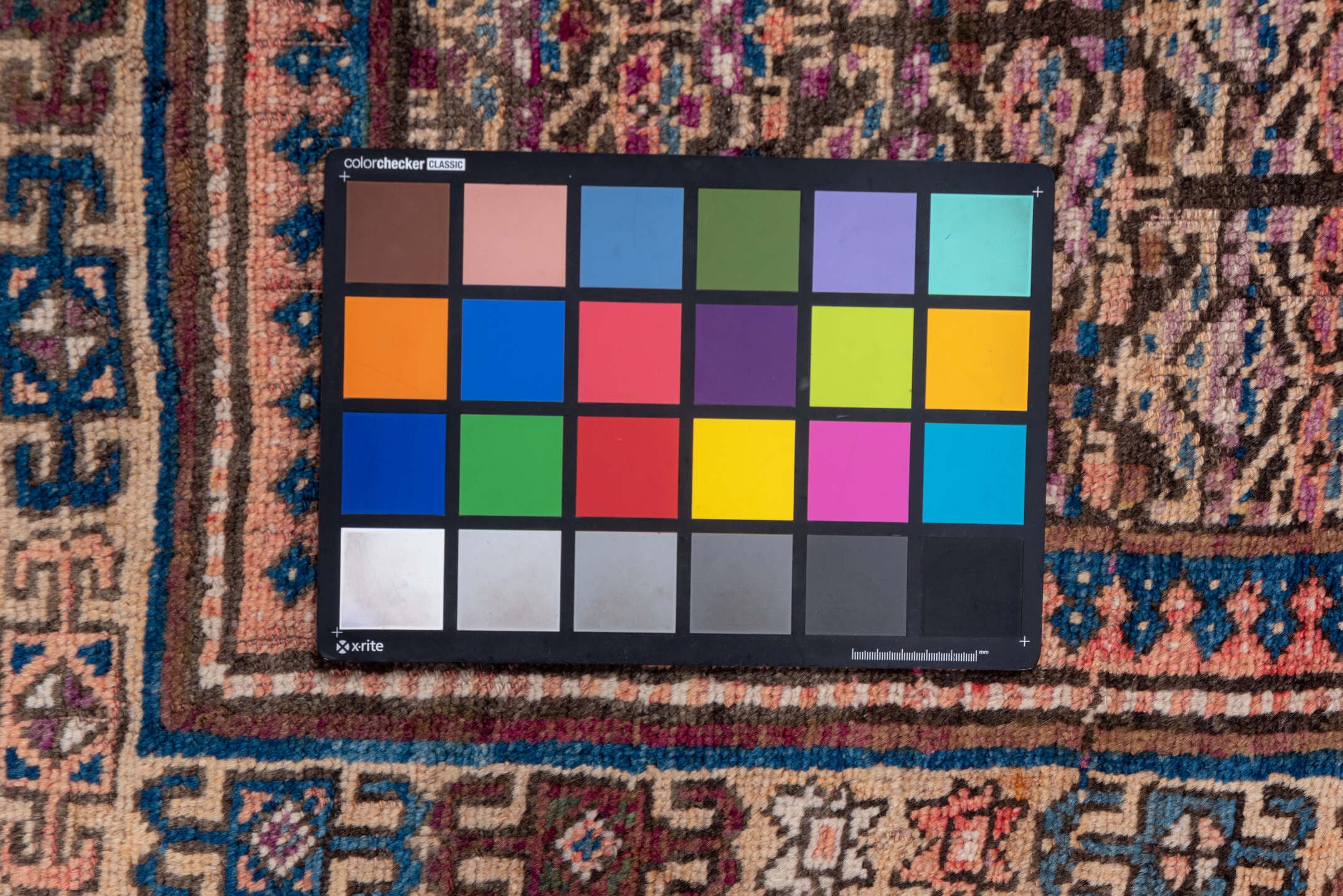 3' x 6' one-of-a-kind handmade antique Kurd small size rug. Color palette: brown, ivory, indigo, sky blue, rose, burgundy