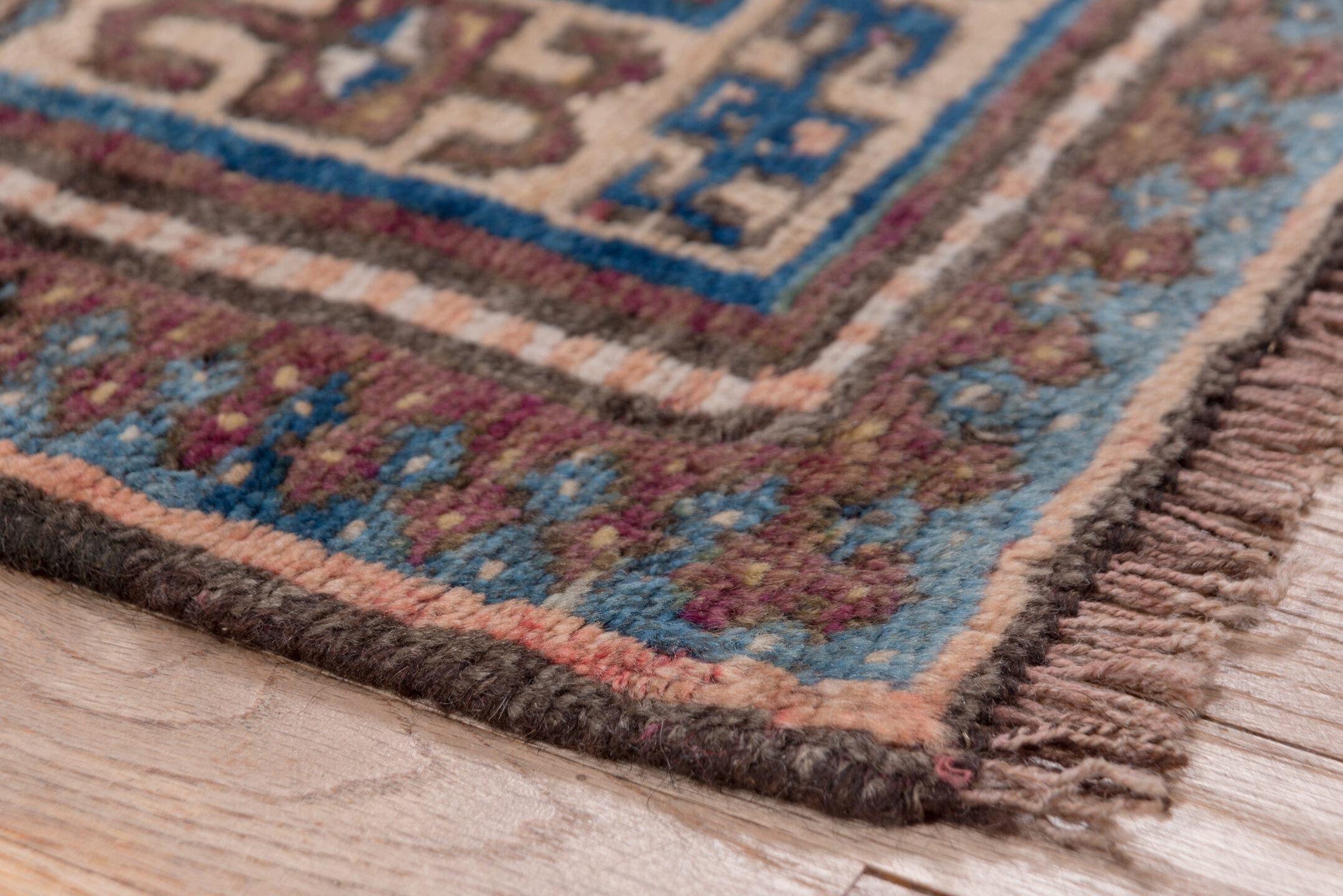 3' x 6' one-of-a-kind handmade antique Kurd small size rug. Color palette: brown, ivory, indigo, sky blue, rose, burgundy