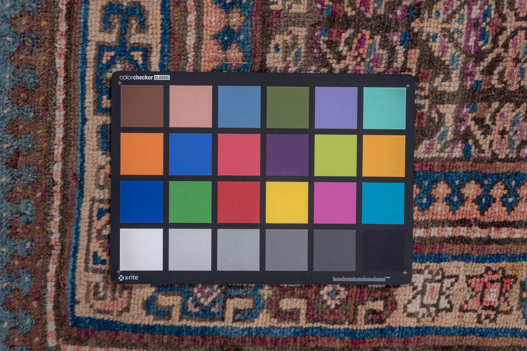 3' x 6' one-of-a-kind handmade antique Kurd small size rug. Color palette: brown, ivory, indigo, sky blue, rose, burgundy