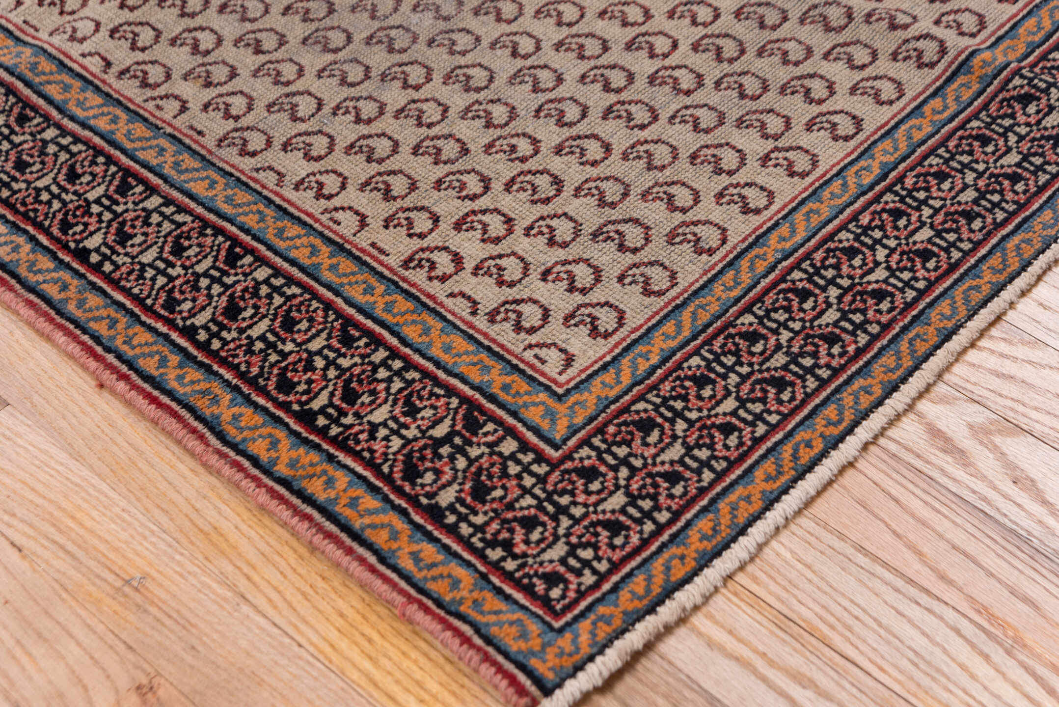 3' x 9' one-of-a-kind handmade antique Sarab runner rug. Color palette: ivory, navy, rust, camel, brown, slate, blue