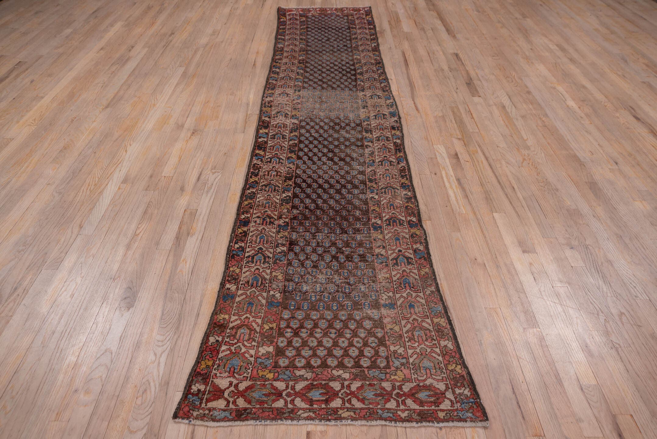 2' x 12' one-of-a-kind handmade antique Malayer runner rug. Color palette: brown, rust, camel, ivory, blue, burgundy