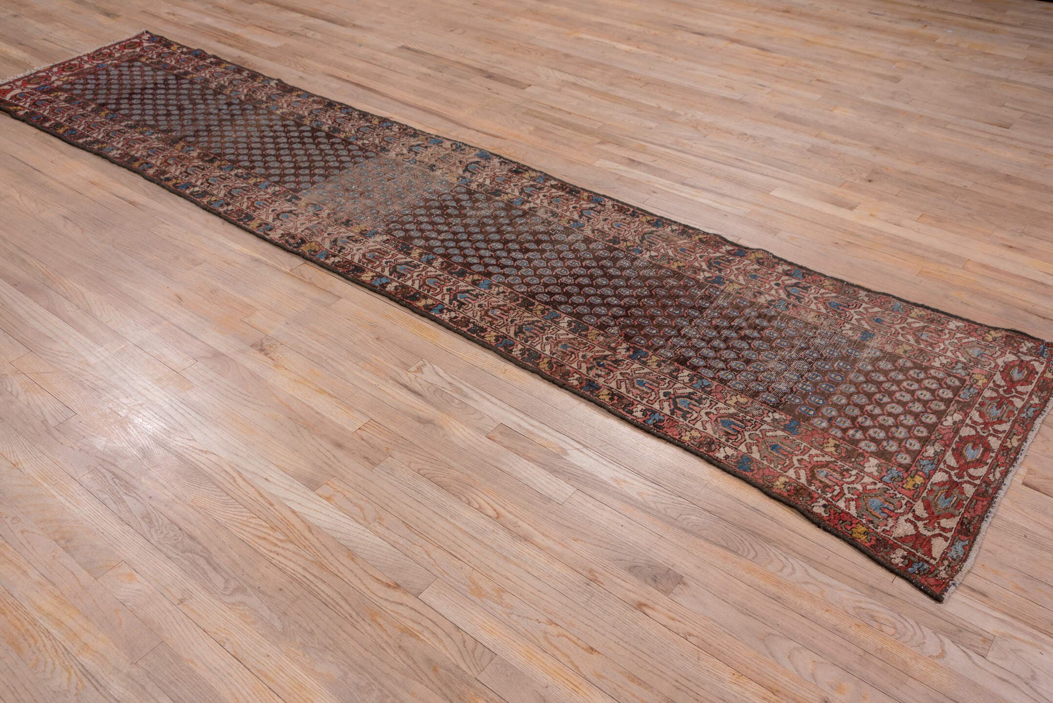 2' x 12' one-of-a-kind handmade antique Malayer runner rug. Color palette: brown, rust, camel, ivory, blue, burgundy