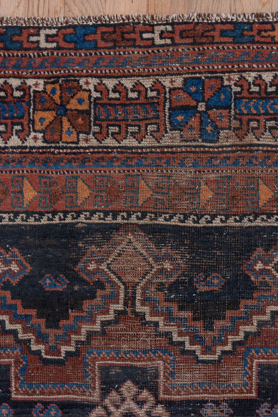 3' x 5' one-of-a-kind handmade antique Afshar small size rug. Color palette: indigo, rust, ivory, cobalt, camel, terracotta