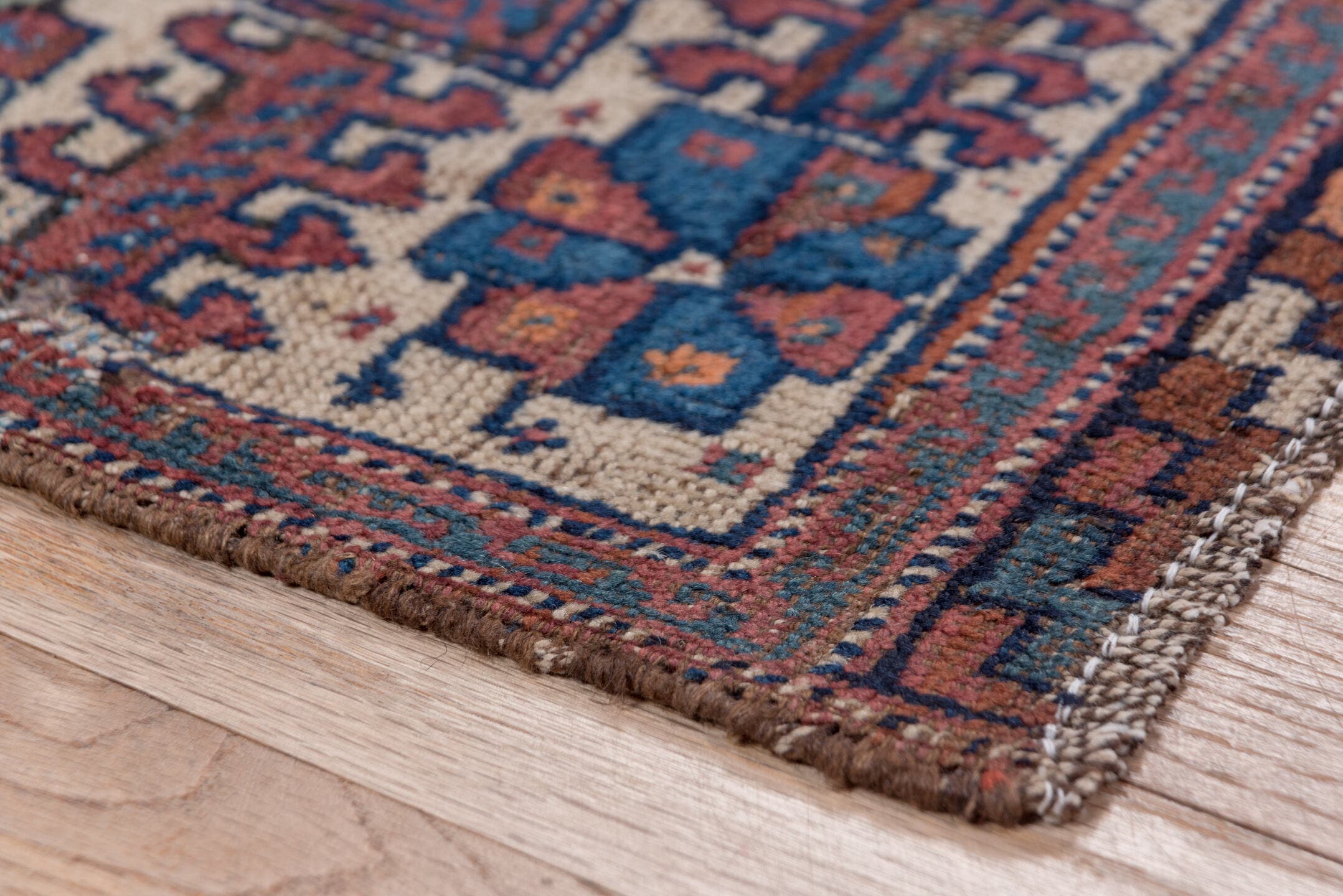 3' x 5' one-of-a-kind handmade antique Afshar small size rug. Color palette: indigo, rust, ivory, cobalt, camel, terracotta