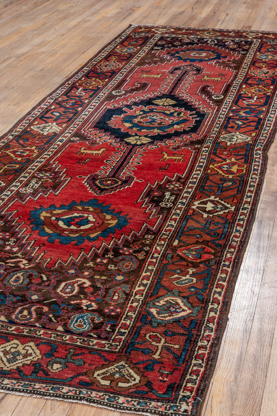 3' x 11' one-of-a-kind handmade vintage Malayer runner rug. Color palette: black, blue, brown, gray, pink, red
