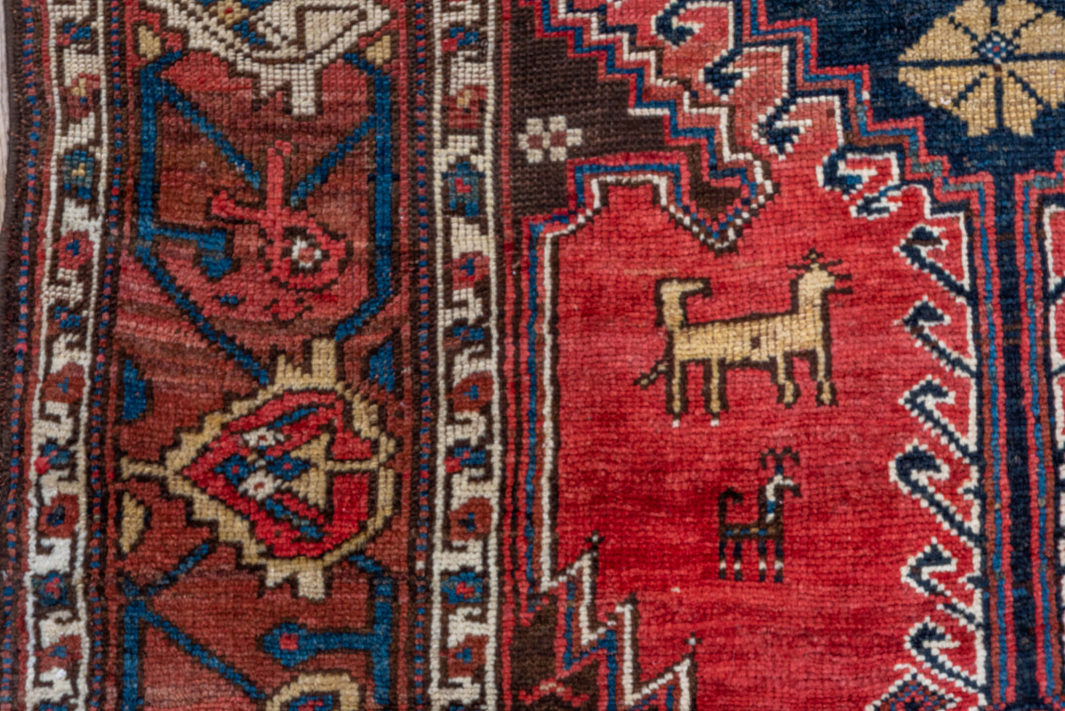 3' x 11' one-of-a-kind handmade vintage Malayer runner rug. Color palette: black, blue, brown, gray, pink, red