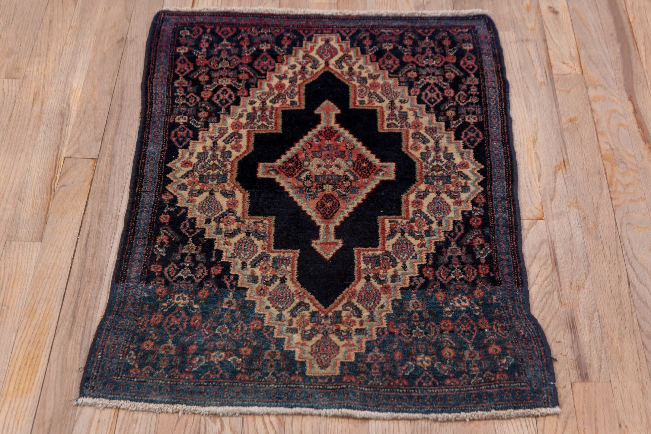 2' x 3' one-of-a-kind handmade antique Senne small size rug. Color palette: navy, ivory, indigo, rust, crimson, rose