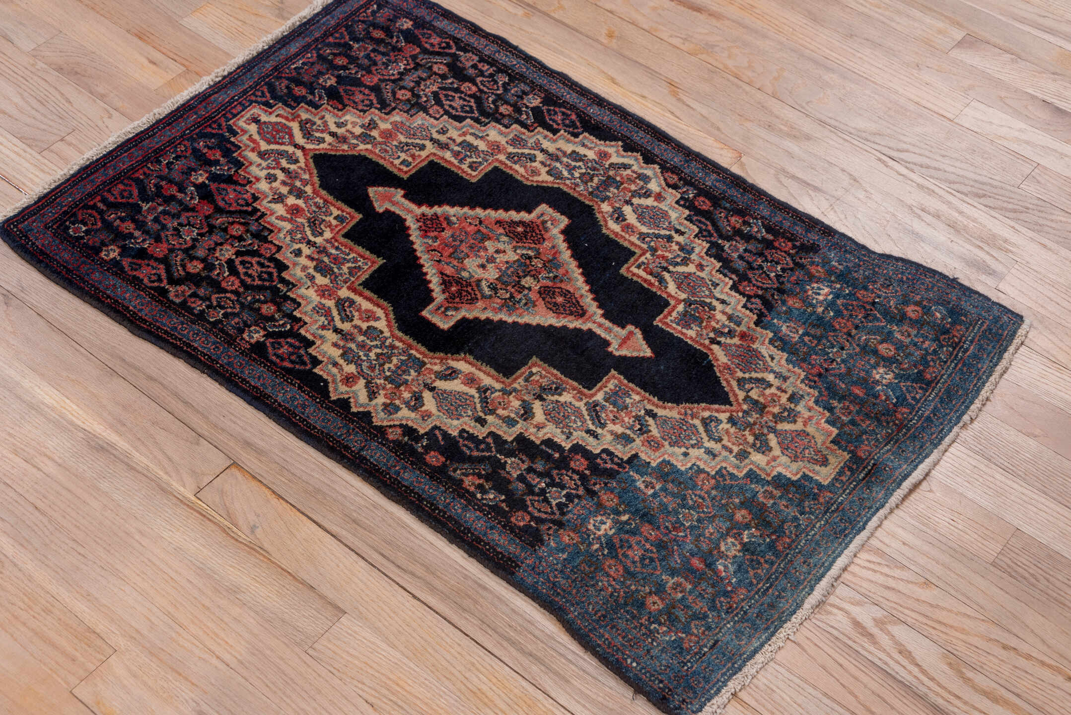 2' x 3' one-of-a-kind handmade antique Senne small size rug. Color palette: navy, ivory, indigo, rust, crimson, rose