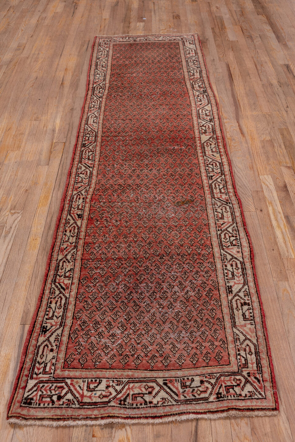 2' x 10' one-of-a-kind handmade vintage Mahal runner rug. Color palette: rose, ivory, rust, charcoal, blush, brown, pink
