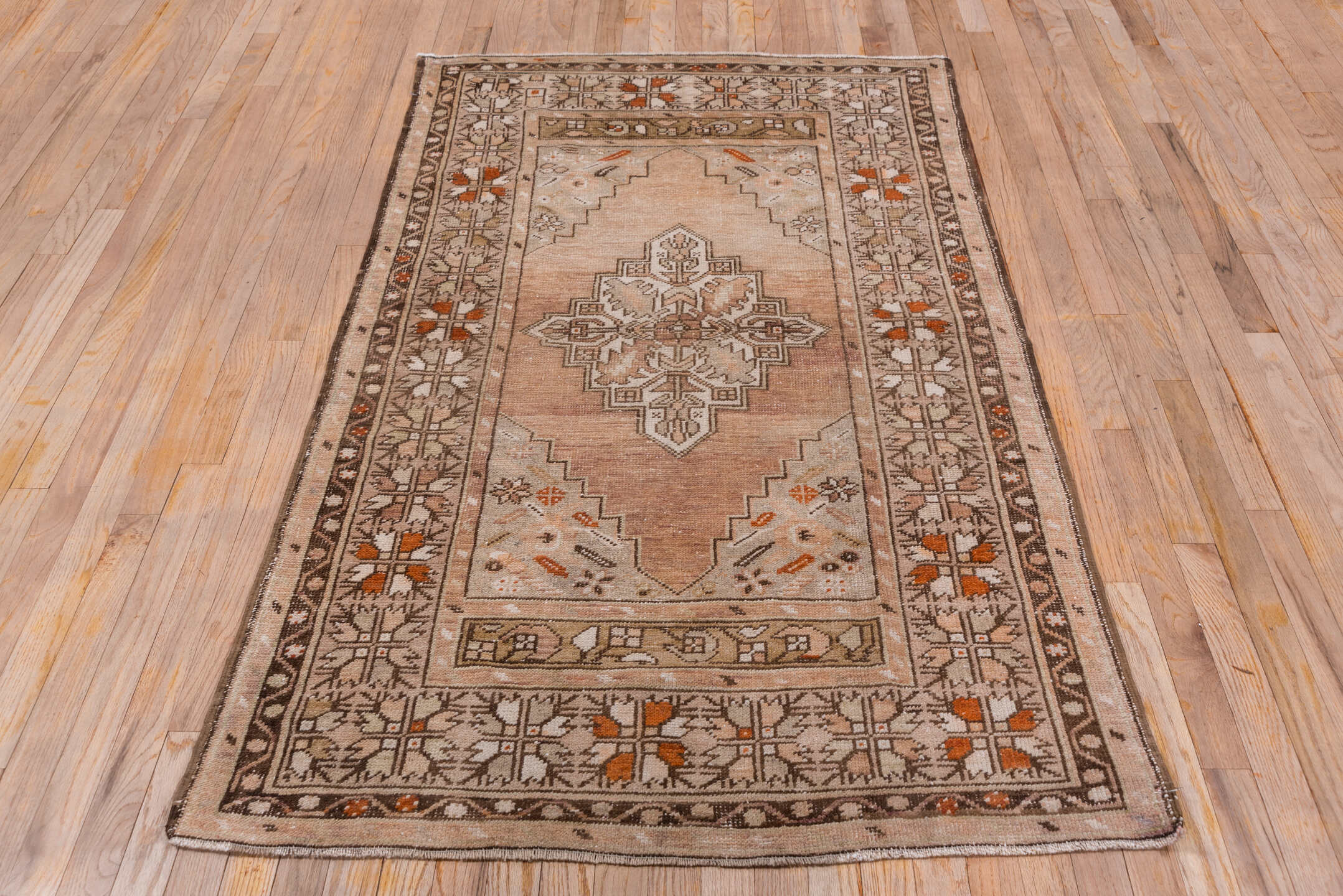 3' x 6' one-of-a-kind handmade vintage Oushak small size rug. Color palette: blush, taupe, ivory, brown, rust, camel