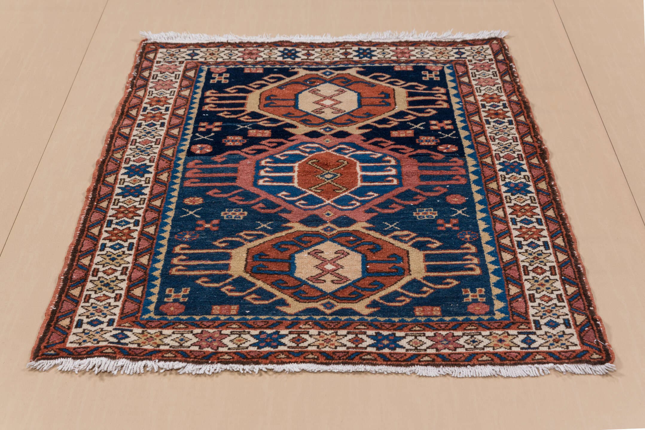 3' x 4' one-of-a-kind handmade antique Karaje small size rug. Color palette: navy, ivory, rust, cobalt, rose, camel, brown