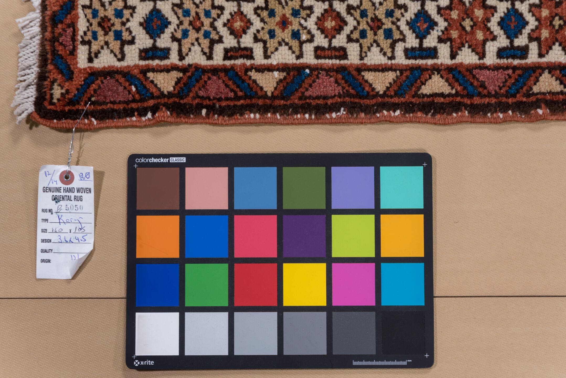 3' x 4' one-of-a-kind handmade antique Karaje small size rug. Color palette: navy, ivory, rust, cobalt, rose, camel, brown